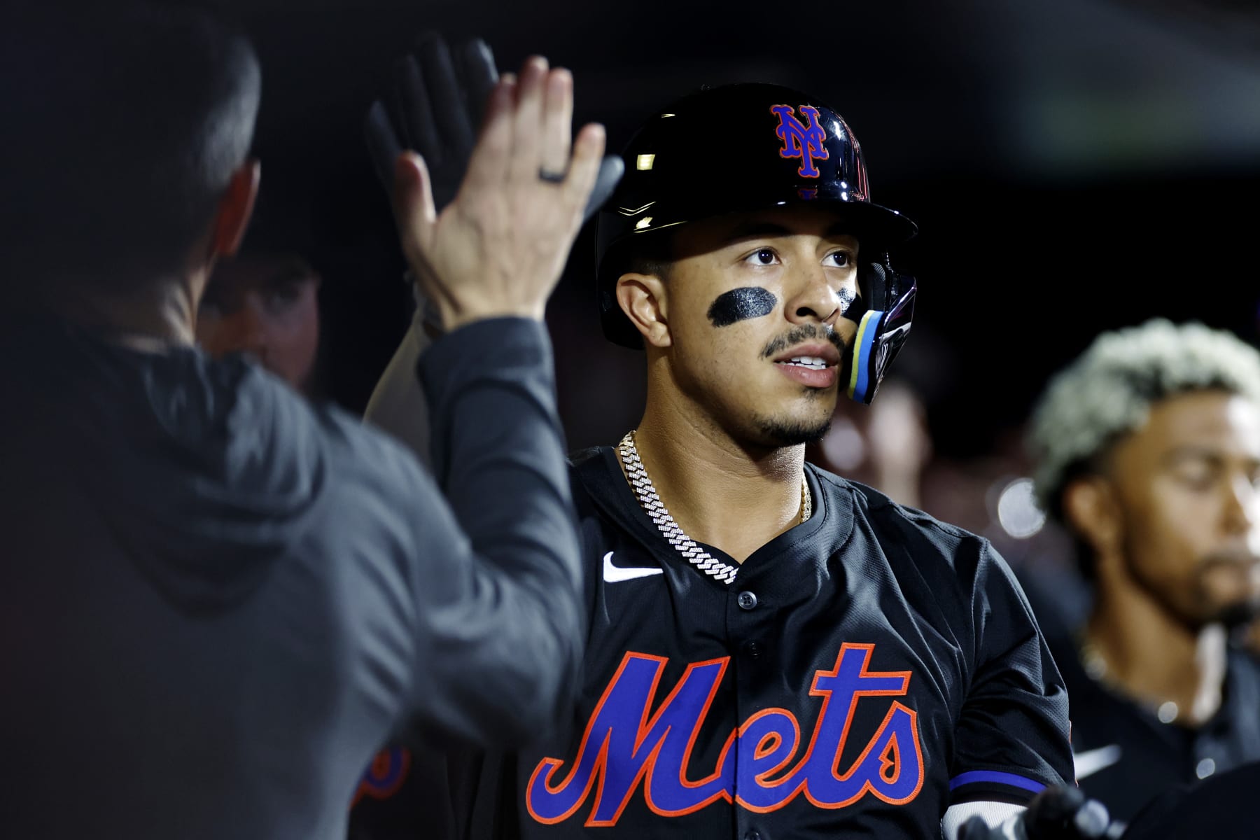 NEW YORK, NEW YORK - MAY 24: Mark Vientos #27 of the New York Mets celebrates in the dugout after hitting a solo home run during the fifth inning against the San Francisco Giants at Citi Field on May 24, 2024 in the Queens borough of New York City. (Photo by Sarah Stier/Getty Images)
