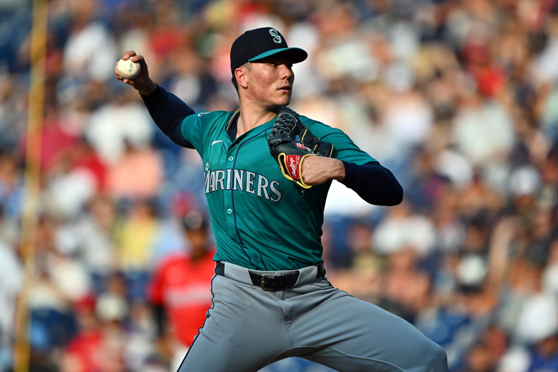 CLEVELAND, OHIO - JUNE 19: Starting pitcher Bryan Woo #22 of the Seattle Mariners pitches during the first inning against the Cleveland Guardians at Progressive Field on June 19, 2024 in Cleveland, Ohio. (Photo by Jason Miller/Getty Images)