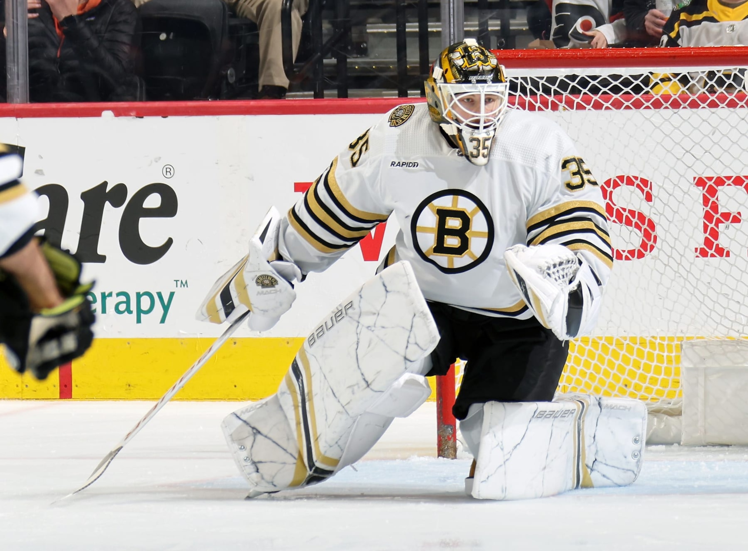 PHILADELPHIA, PENNSYLVANIA - MARCH 23:  Linus Ullmark #35 of the Boston Bruins prepares to stop a shot on goal against the Philadelphia Flyers at the Wells Fargo Center on March 23, 2024 in Philadelphia, Pennsylvania.  (Photo by Len Redkoles/NHLI via Getty Images)