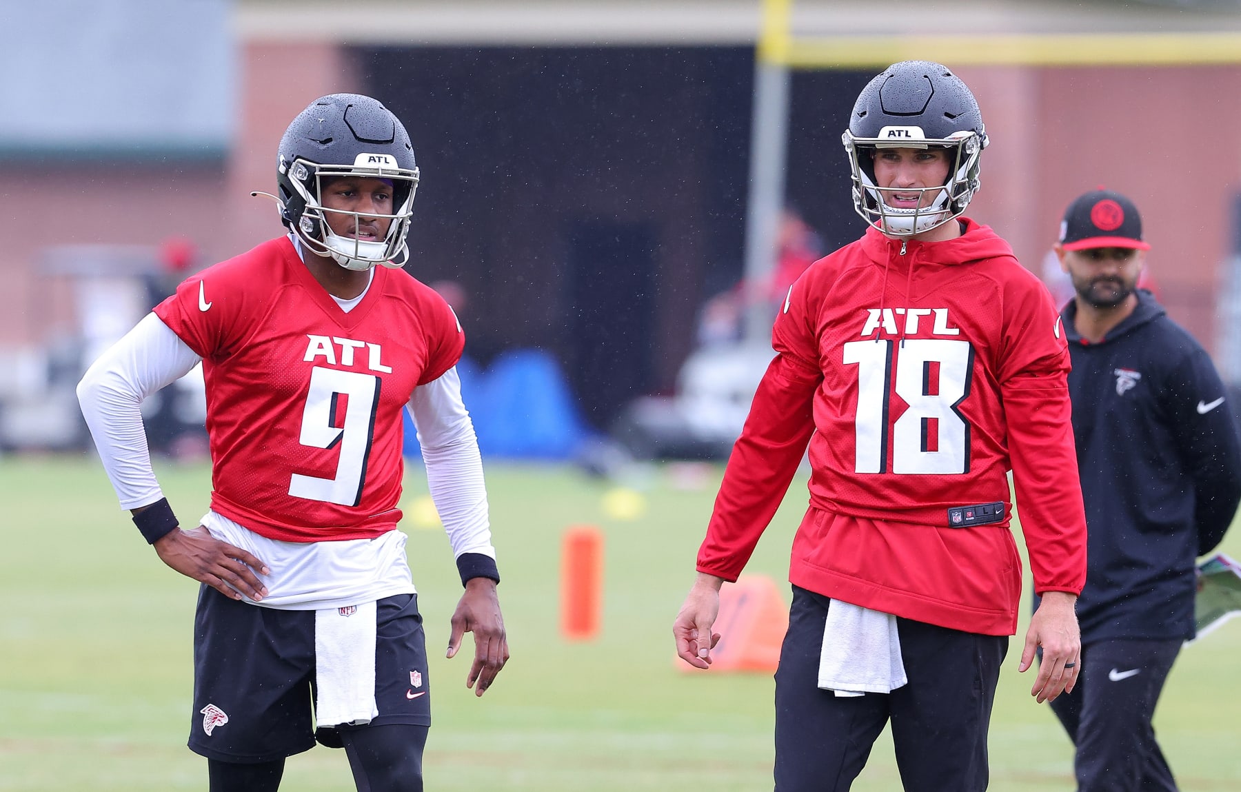 Michael Penix Jr., left, and Kirk Cousins