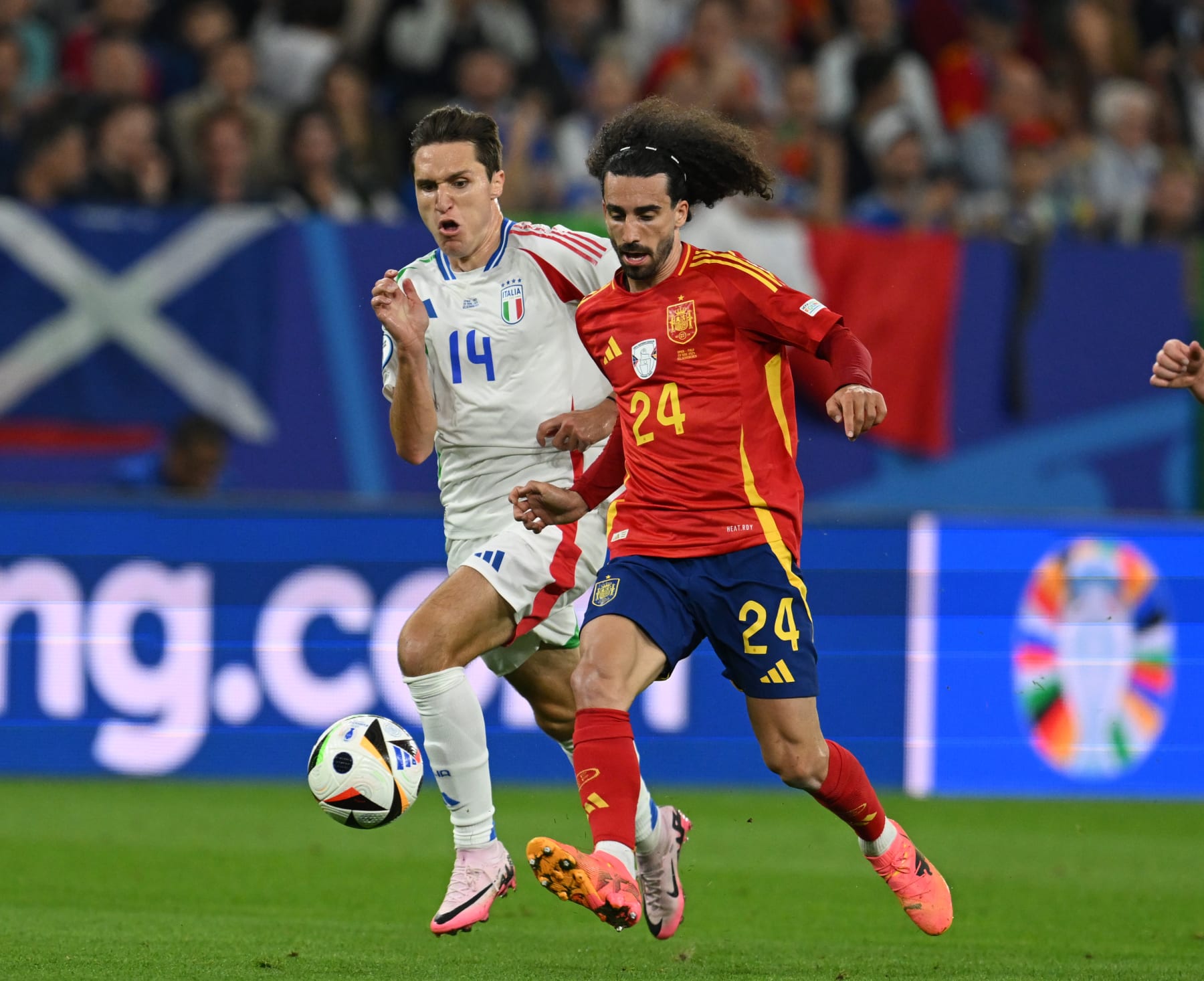 GELSENKIRCHEN, GERMANY - JUNE 20: Marc Cucurella of Spain and Federico Chiesa of Italy compete for the ball during the UEFA EURO 2024 group stage match between Spain and Italy at Arena AufSchalke on June 20, 2024 in Gelsenkirchen, Germany. (Photo by Claudio Villa/Getty Images for FIGC)