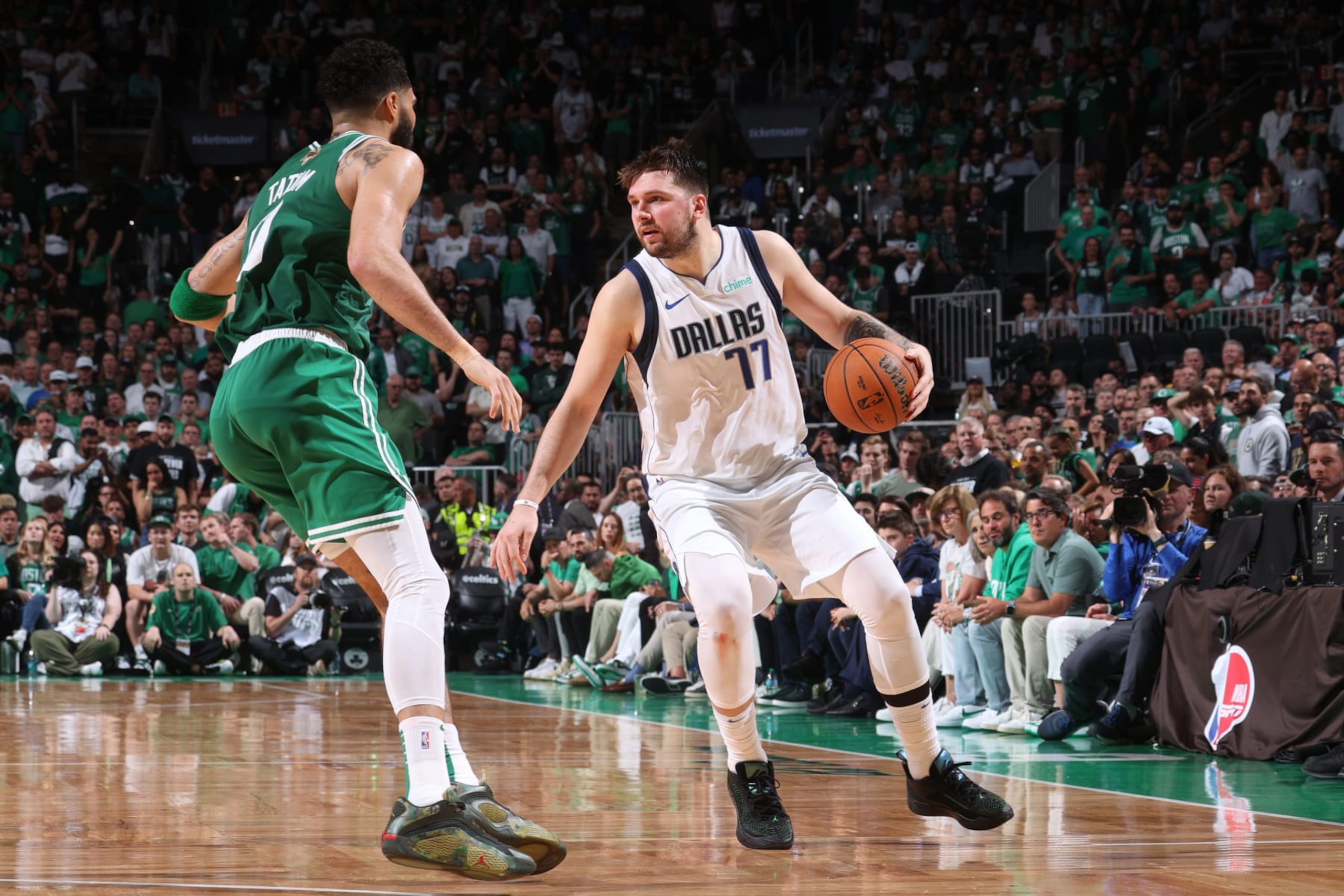 BOSTON, MA - JUNE 17: Luka Doncic #77 of the Dallas Mavericks dribbles the ball during the game against the Boston Celtics during Game 5 of the 2024 NBA Finals on June 17, 2024 at the TD Garden in Boston, Massachusetts. NOTE TO USER: User expressly acknowledges and agrees that, by downloading and or using this photograph, User is consenting to the terms and conditions of the Getty Images License Agreement. Mandatory Copyright Notice: Copyright 2024 NBAE  (Photo by Nathaniel S. Butler/NBAE via Getty Images)