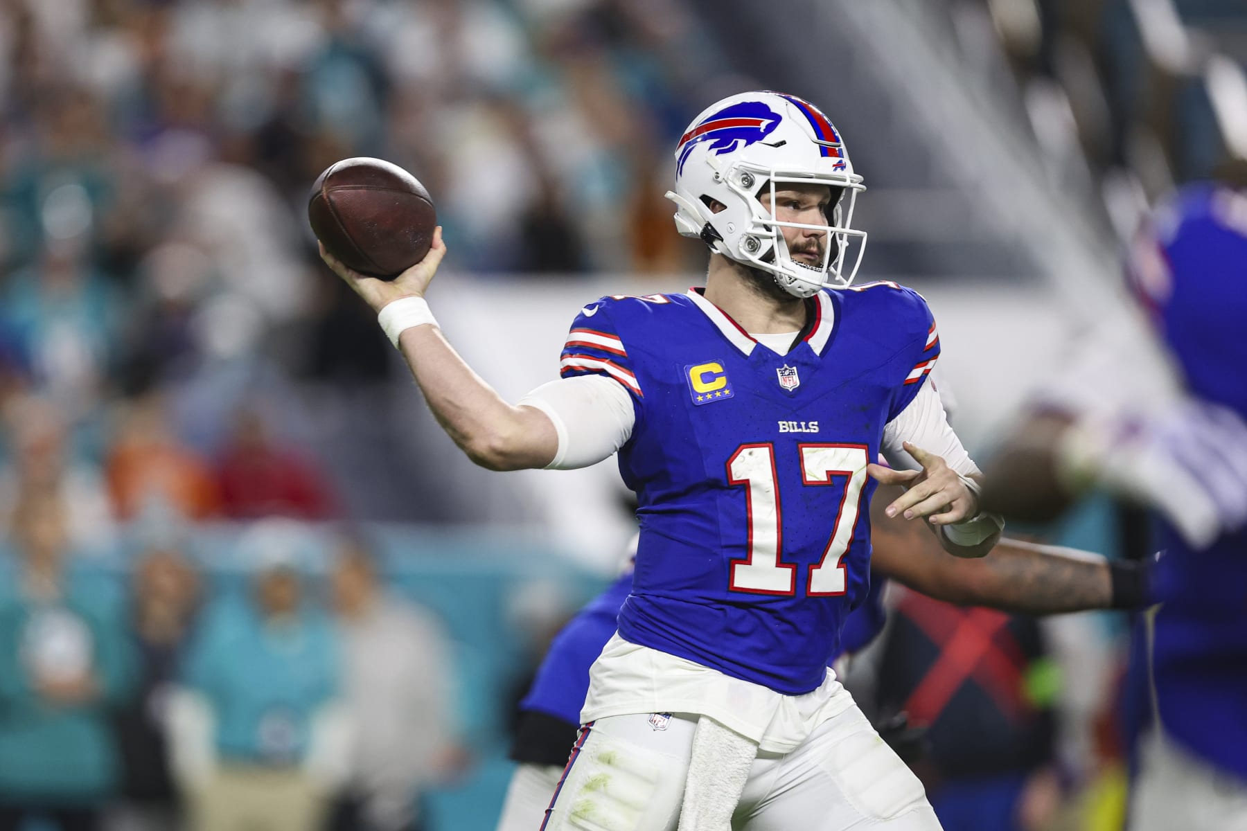 MIAMI GARDENS, FL - JANUARY 07: Josh Allen #17 of the Buffalo Bills throws the ball during an NFL football game against the Miami Dolphins at Hard Rock Stadium on January 7, 2024 in Miami Gardens, Florida. (Photo by Perry Knotts/Getty Images)
