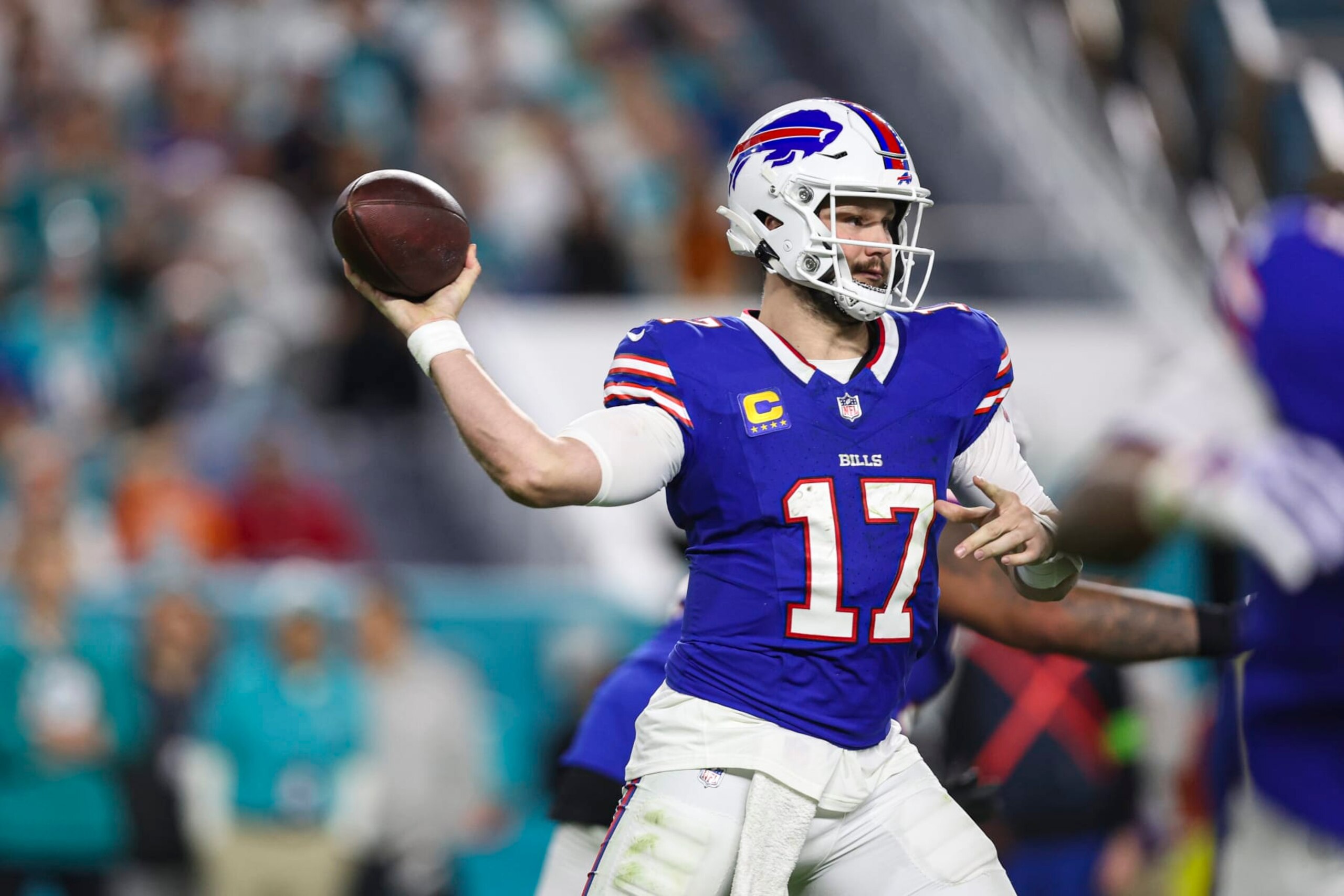 MIAMI GARDENS, FL - JANUARY 07: Josh Allen #17 of the Buffalo Bills throws the ball during an NFL football game against the Miami Dolphins at Hard Rock Stadium on January 7, 2024 in Miami Gardens, Florida. (Photo by Perry Knotts/Getty Images)