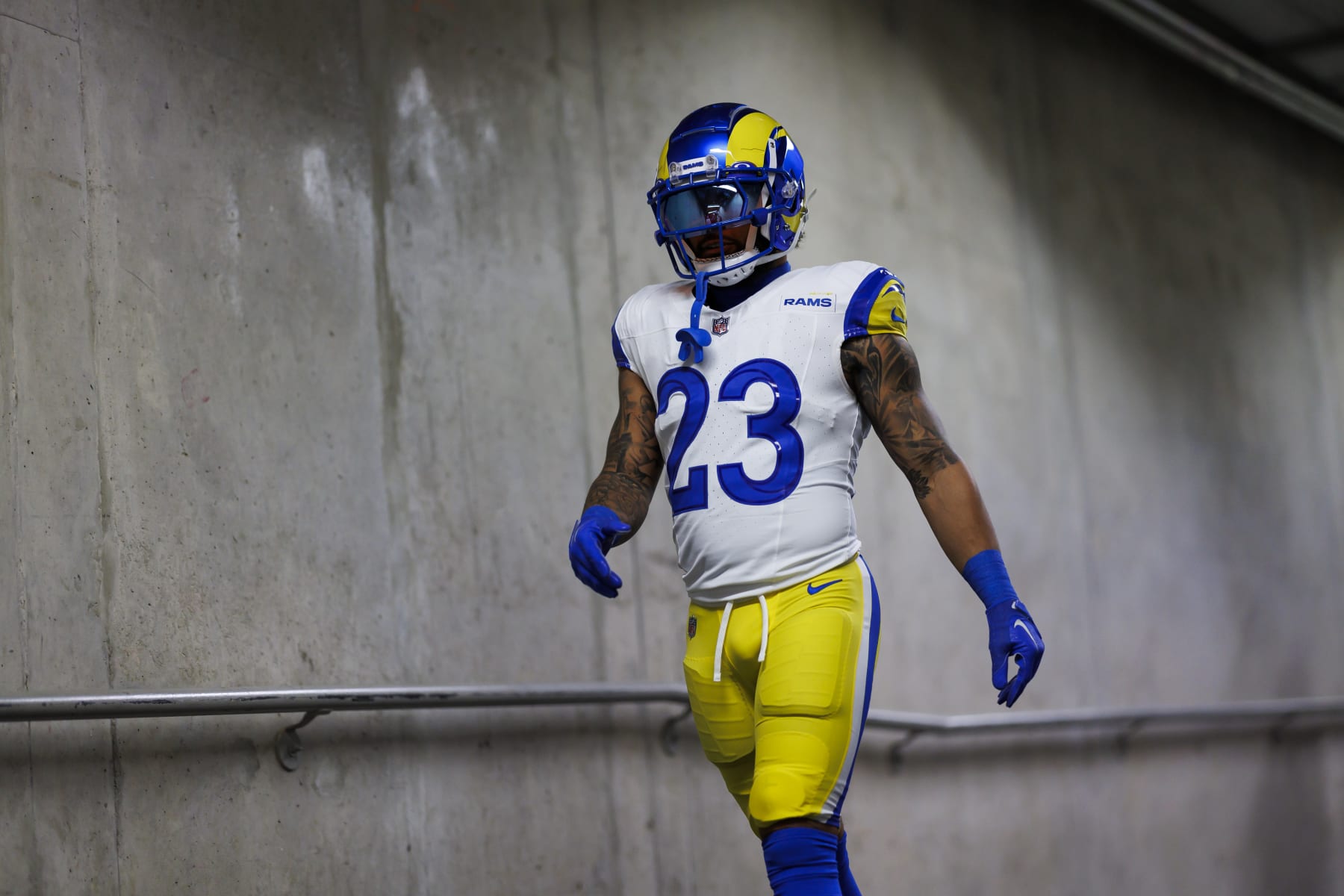 DETROIT, MICHIGAN - JANUARY 14: Kyren Williams #23 of the Los Angeles Rams walks to the field through the locker room tunnel during pregame warmups prior to an NFC Wild Card Playoff football game against the Detroit Lions at Ford Field on January 14, 2024 in Detroit, Michigan. (Photo by Ryan Kang/Getty Images)