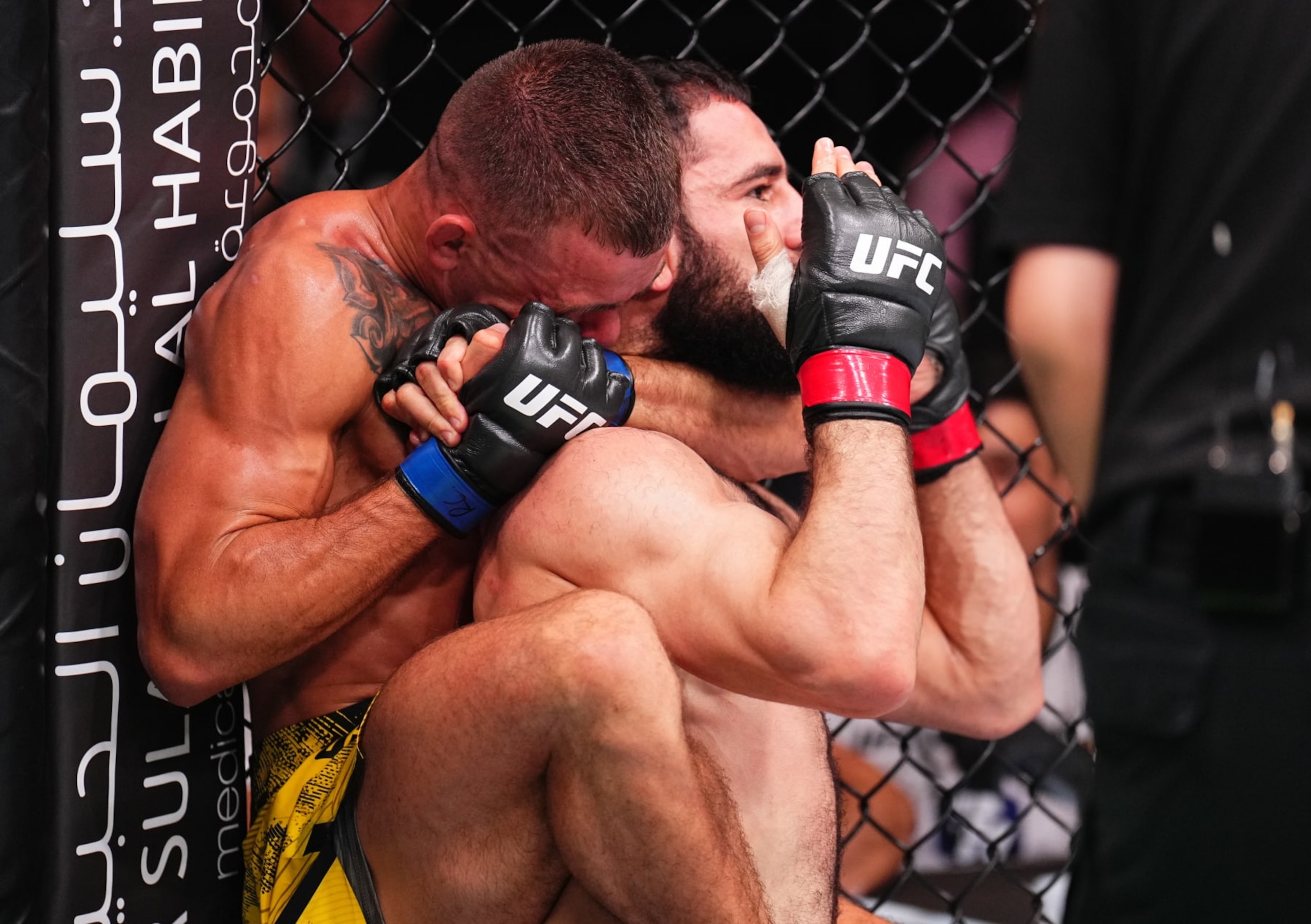 RIYADH, SAUDI ARABIA - JUNE 22: (L-R) Felipe Lima of Brazil secures a rear choke submission against Muhammad Naimov of Tajikistan in a featherweight fight during the UFC Fight Night event at Kingdom Arena on June 22, 2024 in Riyadh, Saudi Arabia. (Photo by Chris Unger/Zuffa LLC via Getty Images) RIYADH, SAUDI ARABIA - JUNE 22: (L-R) Felipe Lima of Brazil secures a rear choke submission against Muhammad Naimov of Tajikistan in a featherweight fight during the UFC Fight Night event at Kingdom Arena on June 22, 2024 in Riyadh, Saudi Arabia. (Photo by Chris Unger/Zuffa LLC via Getty Images)