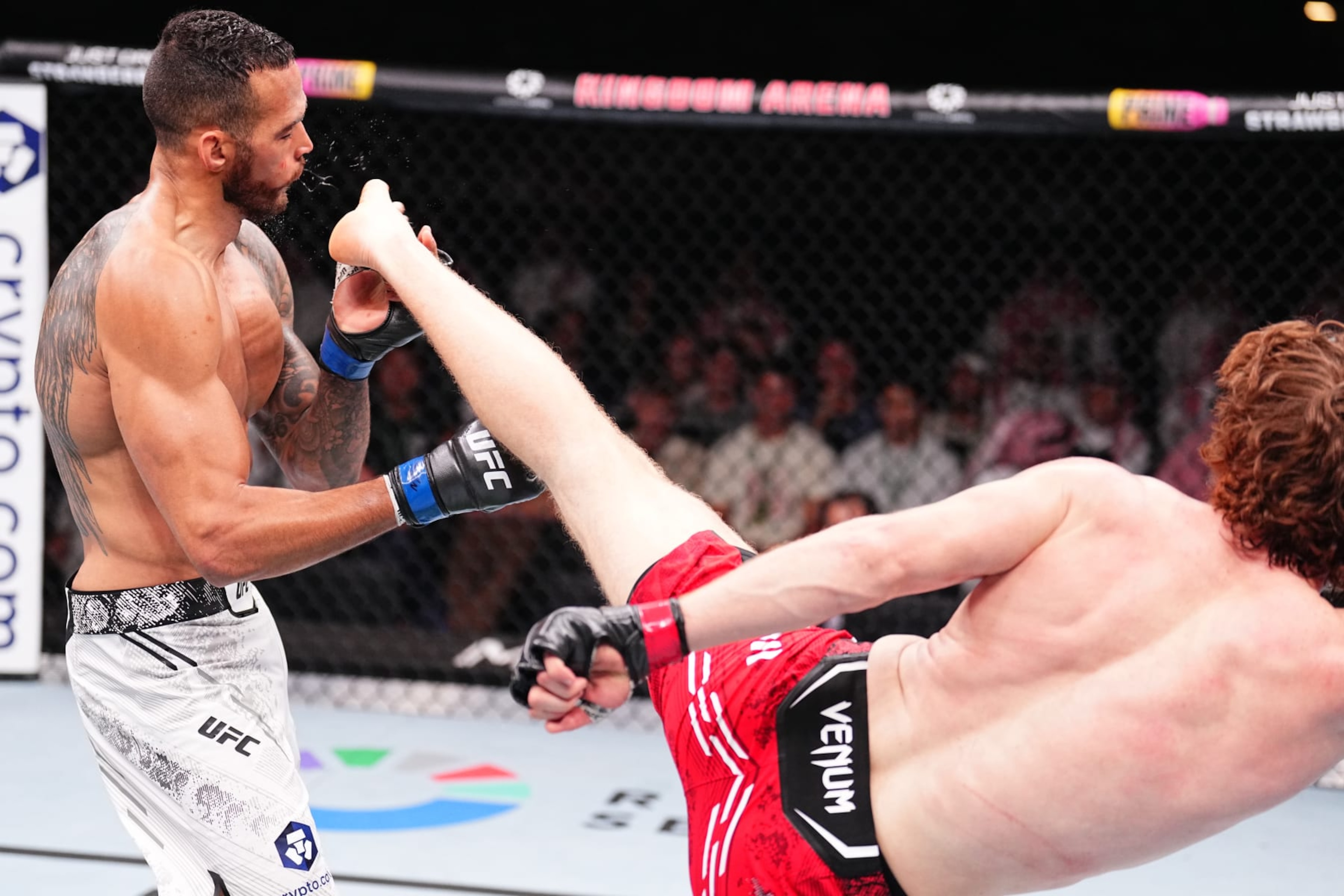 RIYADH, SAUDI ARABIA - JUNE 22: (R-L) Shara Magomedov of Russia kicks Antonio Trocoli of Brazil in a middleweight fight during the UFC Fight Night event at Kingdom Arena on June 22, 2024 in Riyadh, Saudi Arabia. (Photo by Chris Unger/Zuffa LLC via Getty Images)