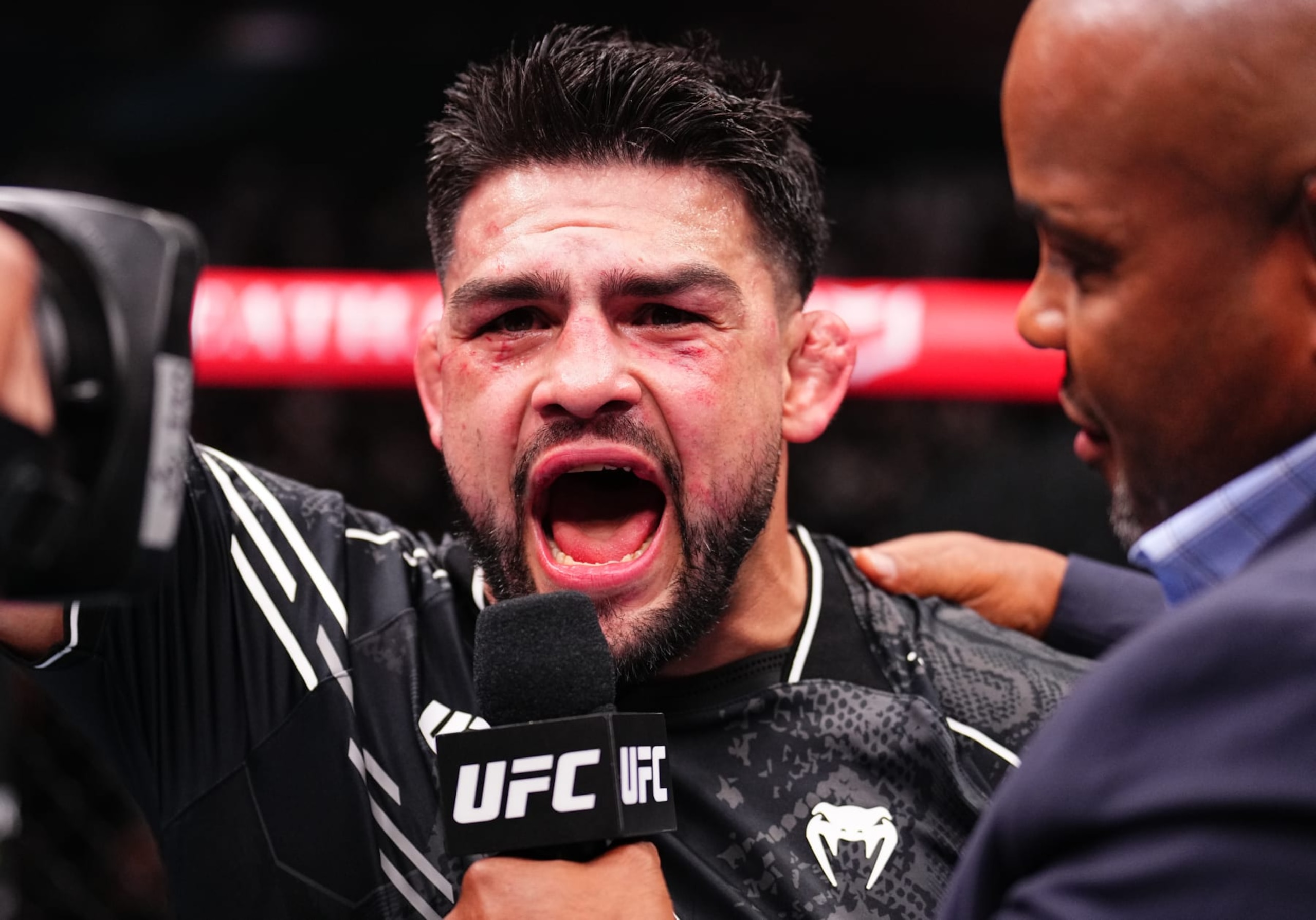 RIYADH, SAUDI ARABIA - JUNE 22: Kelvin Gastelum reacts after his victory against Daniel Rodriguez in a middleweight fight during the UFC Fight Night event at Kingdom Arena on June 22, 2024 in Riyadh, Saudi Arabia. (Photo by Chris Unger/Zuffa LLC via Getty Images) RIYADH, SAUDI ARABIA - JUNE 22: Kelvin Gastelum reacts after his victory against Daniel Rodriguez in a middleweight fight during the UFC Fight Night event at Kingdom Arena on June 22, 2024 in Riyadh, Saudi Arabia. (Photo by Chris Unger/Zuffa LLC via Getty Images)