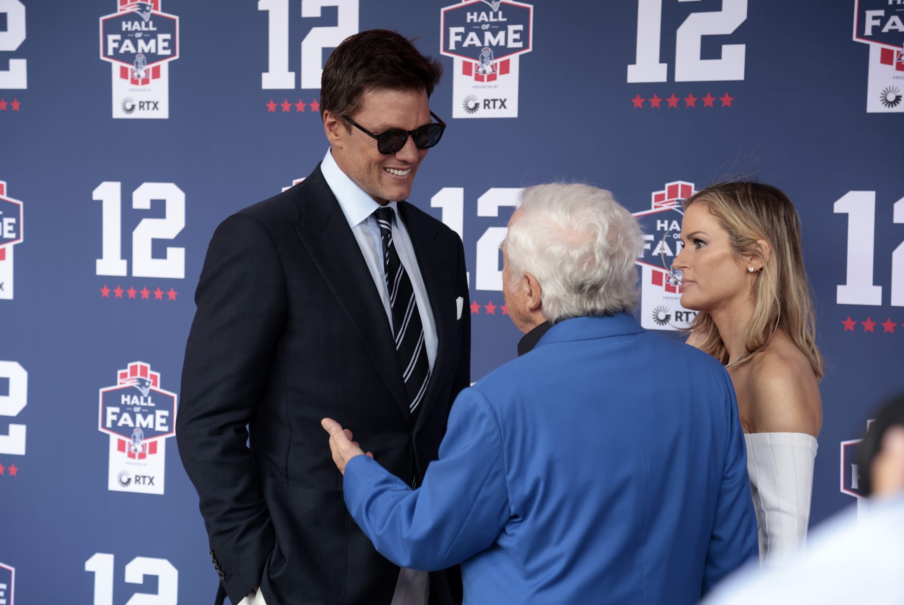 FOXBOROUGH, MA - JUNE 12: Tom Brady, New England Patriots chairman and CEO Robert Kraft and his wife Dana Blumberg during the induction of Tom Brady into the New England Patriots Hall of Fame on June 12, 2024 at Gillette Stadium in Foxborough, Massachusetts. (Photo by Fred Kfoury III/Icon Sportswire via Getty Images)