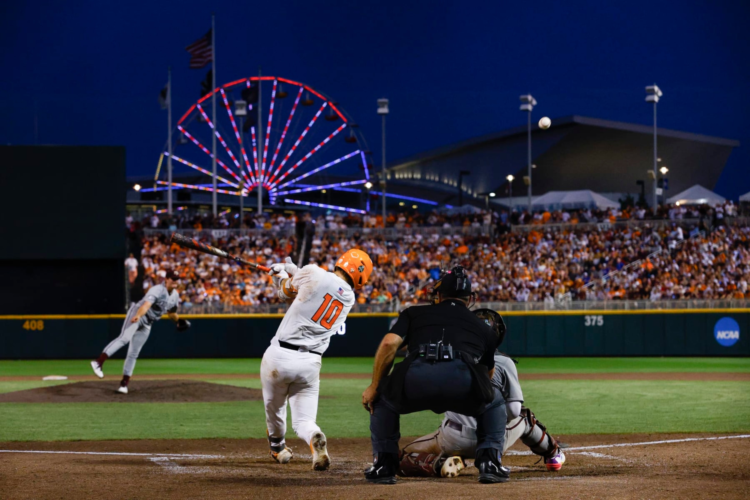OMAHA, NEBRASKA - JUNE 22: Cal Stark #10 of the Tennessee Volunteers hits against the Texas A&M Aggies during the Division I Men's Baseball Championship held at Charles Schwab Field on June 22, 2024 in Omaha, Nebraska. (Photo by C. Morgan Engel/NCAA Photos via Getty Images) OMAHA, NEBRASKA - JUNE 22: Cal Stark #10 of the Tennessee Volunteers hits against the Texas A&M Aggies during the Division I Men's Baseball Championship held at Charles Schwab Field on June 22, 2024 in Omaha, Nebraska. (Photo by C. Morgan Engel/NCAA Photos via Getty Images)