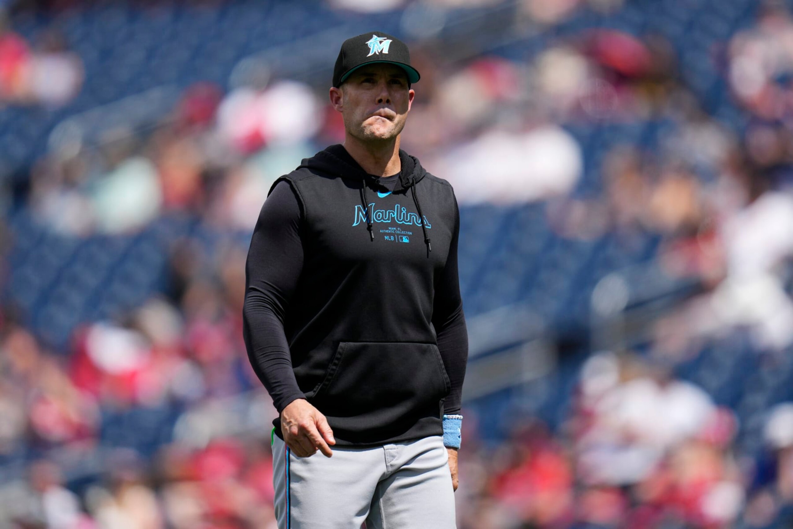 WASHINGTON, DC - JUNE 16: Skip Schumaker #45 of the Miami Marlins walks to the dugout after making a pitching change during the sixth inning against the Washington Nationals at Nationals Park on June 16, 2024 in Washington, DC. (Photo by Jess Rapfogel/Getty Images)