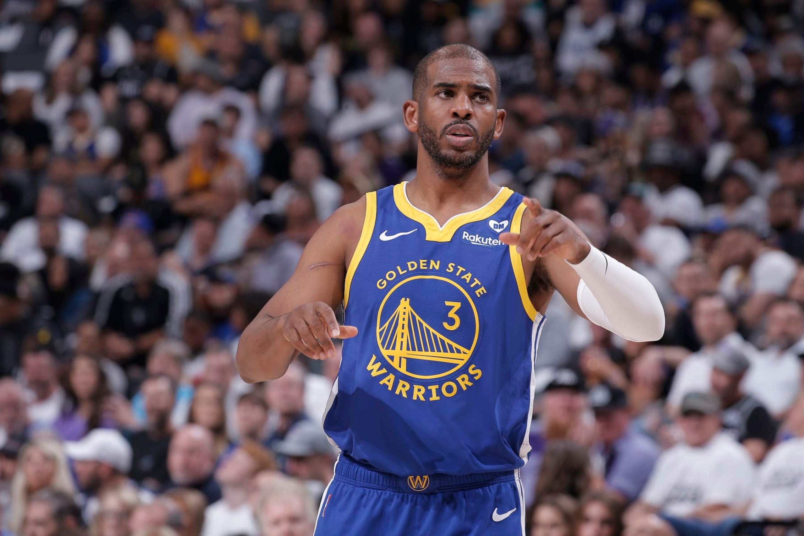 SACRAMENTO, CA - APRIL 16: Chris Paul #3 of the Golden State Warriors calls a play during the game against the Sacramento Kings during the 2024 Play-In Tournament on April 16, 2024 at Golden 1 Center in Sacramento, California. NOTE TO USER: User expressly acknowledges and agrees that, by downloading and or using this photograph, User is consenting to the terms and conditions of the Getty Images Agreement. Mandatory Copyright Notice: Copyright 2024 NBAE (Photo by Rocky Widner/NBAE via Getty Images)