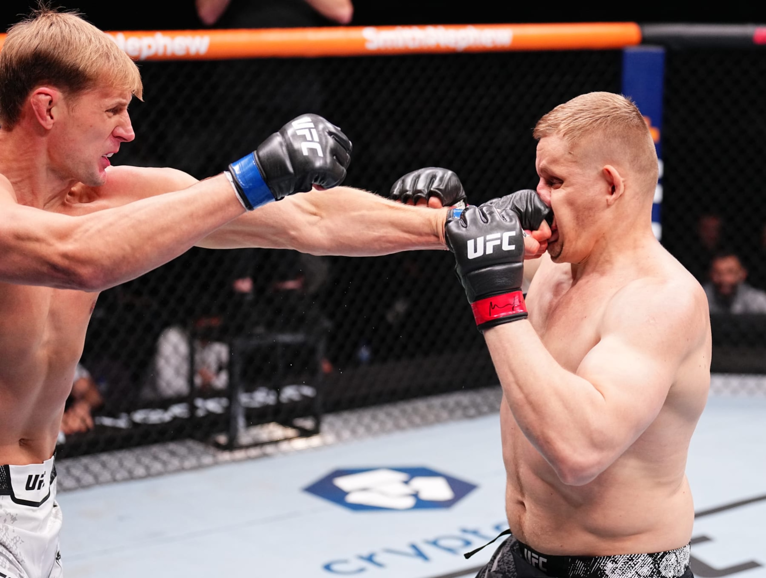 Alexander Volkov punches Sergei Pavlovich.
