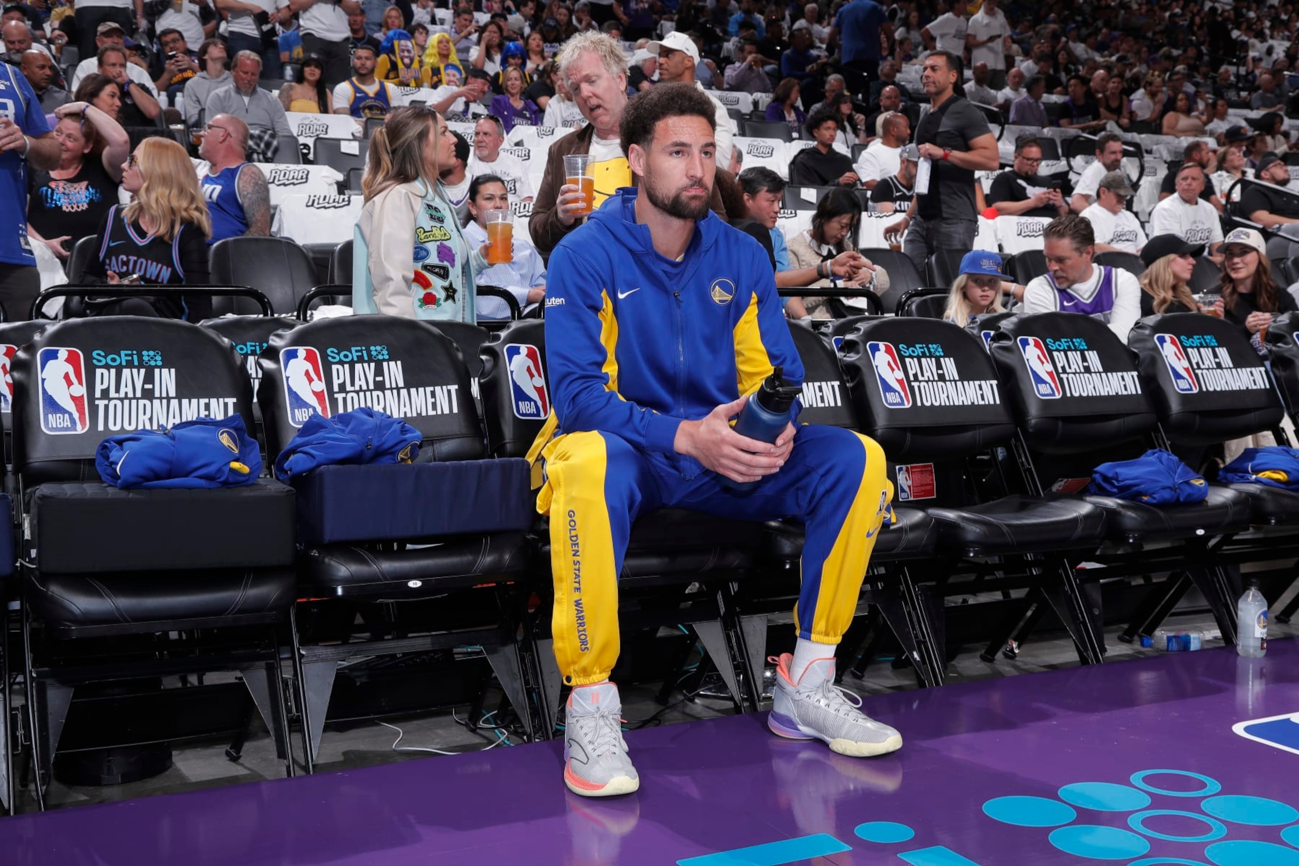 SACRAMENTO, CA - APRIL 16: Klay Thompson #11 of the Golden State Warriors looks on from the bench prior to the game against the Sacramento Kings during the 2024 Play-In Tournament on April 16, 2024 at Golden 1 Center in Sacramento, California. NOTE TO USER: User expressly acknowledges and agrees that, by downloading and or using this photograph, User is consenting to the terms and conditions of the Getty Images Agreement. Mandatory Copyright Notice: Copyright 2024 NBAE (Photo by Rocky Widner/NBAE via Getty Images)
