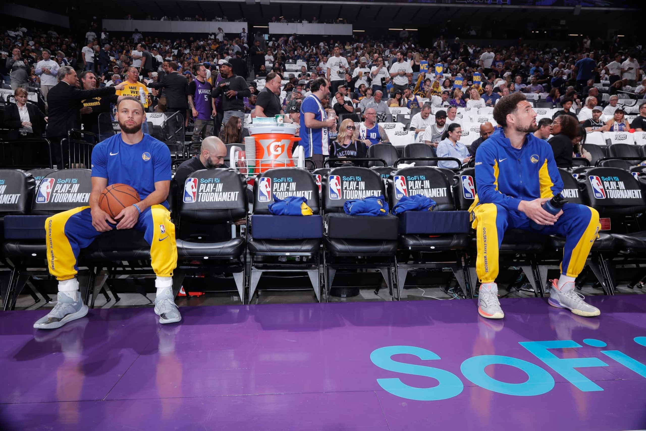 SACRAMENTO, CA - APRIL 16: Stephen Curry #30 and Klay Thompson #11 of the Golden State Warriors look on from the bench prior to the game against the Sacramento Kings during the 2024 Play-In Tournament on April 16, 2024 at Golden 1 Center in Sacramento, California. NOTE TO USER: User expressly acknowledges and agrees that, by downloading and or using this photograph, User is consenting to the terms and conditions of the Getty Images Agreement. Mandatory Copyright Notice: Copyright 2024 NBAE (Photo by Rocky Widner/NBAE via Getty Images)