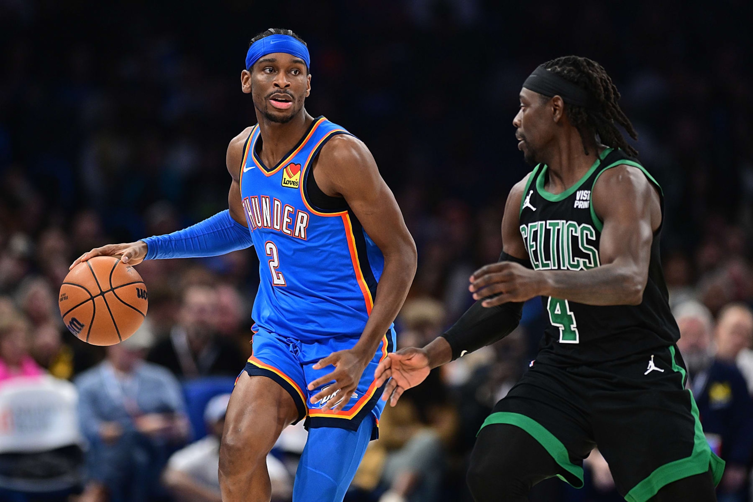OKLAHOMA CITY, OKLAHOMA - JANUARY 2: Shai Gilgeous-Alexander #2 of the Oklahoma City Thunder handles the ball during the second half against the Boston Celtics at Paycom Center on January 2, 2024 in Oklahoma City, Oklahoma. NOTE TO USER: User expressly acknowledges and agrees that, by downloading and or using this Photograph, user is consenting to the terms and conditions of the Getty Images License Agreement. (Photo by Joshua Gateley/Getty Images) OKLAHOMA CITY, OKLAHOMA - JANUARY 2: Shai Gilgeous-Alexander #2 of the Oklahoma City Thunder handles the ball during the second half against the Boston Celtics at Paycom Center on January 2, 2024 in Oklahoma City, Oklahoma. NOTE TO USER: User expressly acknowledges and agrees that, by downloading and or using this Photograph, user is consenting to the terms and conditions of the Getty Images License Agreement. (Photo by Joshua Gateley/Getty Images)