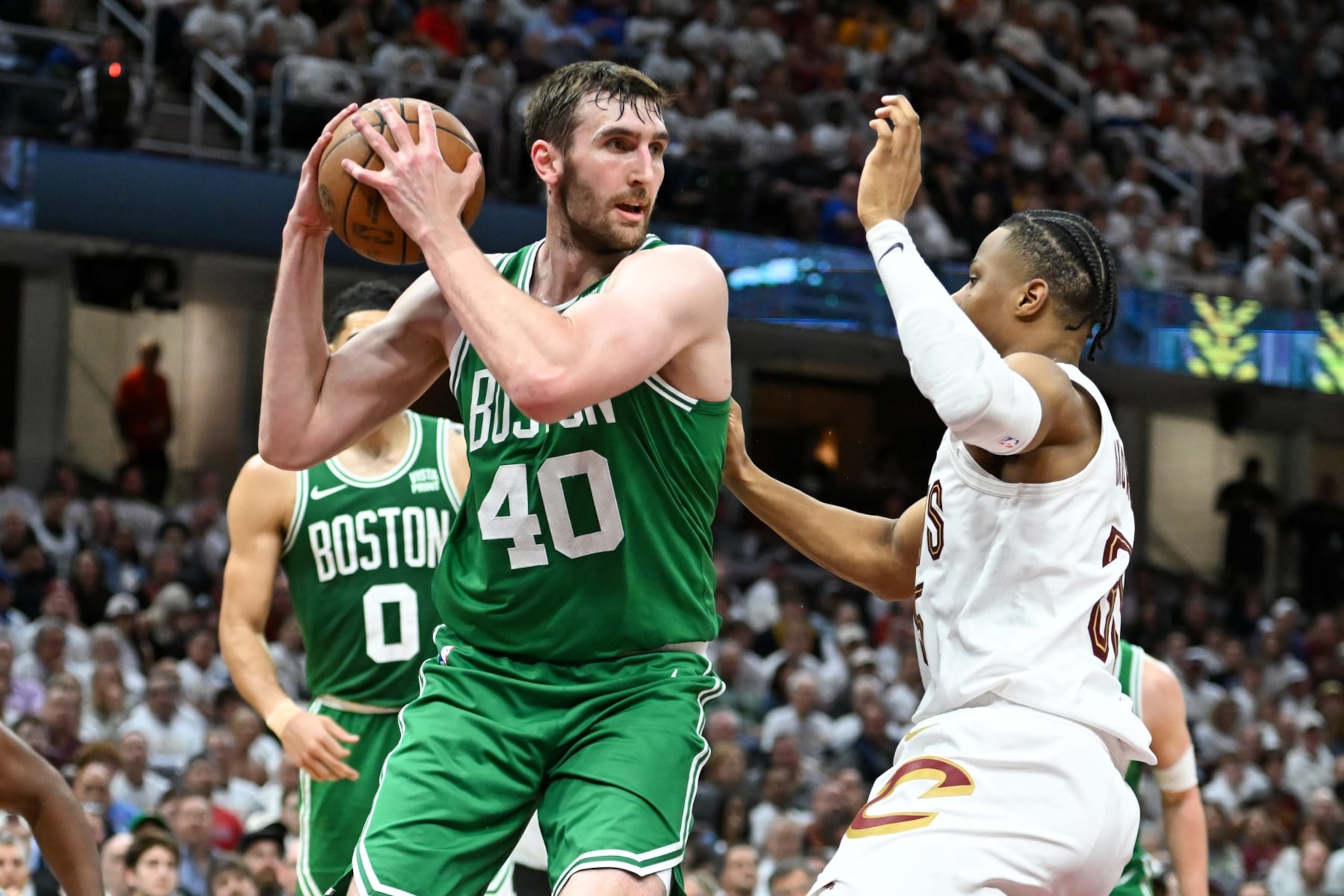 CLEVELAND, OHIO - MAY 13: Luke Kornet #40 of the Boston Celtics drives to the basket against Isaac Okoro #35 of the Cleveland Cavaliers during the second half of Game Four of the Eastern Conference Second Round Playoffs at Rocket Mortgage Fieldhouse on May 13, 2024 in Cleveland, Ohio. NOTE TO USER: User expressly acknowledges and agrees that, by downloading and or using this photograph, User is consenting to the terms and conditions of the Getty Images License Agreement. (Photo by Nick Cammett/Getty Images) CLEVELAND, OHIO - MAY 13: Luke Kornet #40 of the Boston Celtics drives to the basket against Isaac Okoro #35 of the Cleveland Cavaliers during the second half of Game Four of the Eastern Conference Second Round Playoffs at Rocket Mortgage Fieldhouse on May 13, 2024 in Cleveland, Ohio. NOTE TO USER: User expressly acknowledges and agrees that, by downloading and or using this photograph, User is consenting to the terms and conditions of the Getty Images License Agreement. (Photo by Nick Cammett/Getty Images)