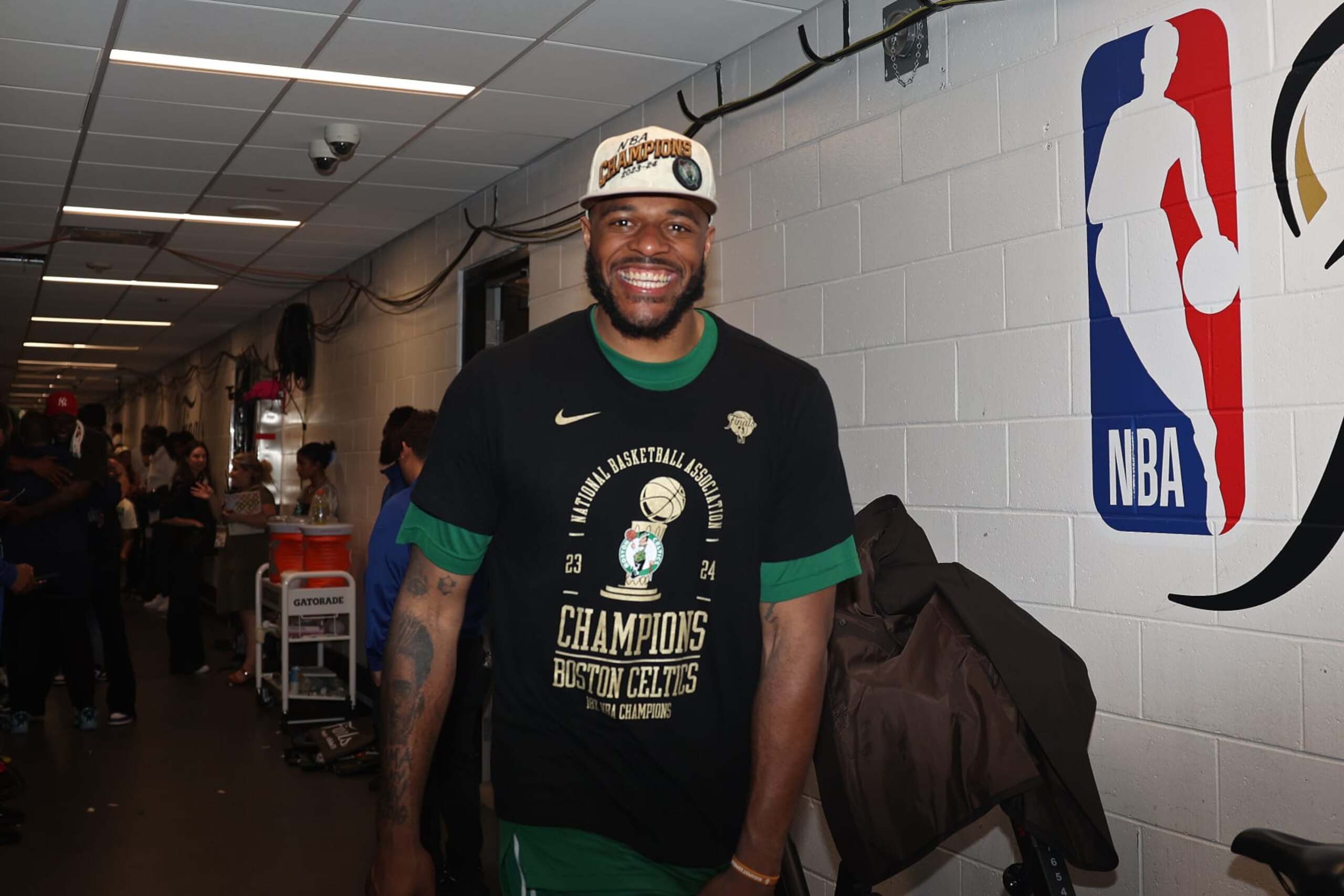 BOSTON, MA - JUNE 17: Xavier Tillman #26 of the Boston Celtics smiles after the game against the Dallas Mavericks during Game 5 of the 2024 NBA Finals on June 17, 2024 at the TD Garden in Boston, Massachusetts. NOTE TO USER: User expressly acknowledges and agrees that, by downloading and or using this photograph, User is consenting to the terms and conditions of the Getty Images License Agreement. Mandatory Copyright Notice: Copyright 2024 NBAE (Photo by Grace Beal/NBAE via Getty Images) BOSTON, MA - JUNE 17: Xavier Tillman #26 of the Boston Celtics smiles after the game against the Dallas Mavericks during Game 5 of the 2024 NBA Finals on June 17, 2024 at the TD Garden in Boston, Massachusetts. NOTE TO USER: User expressly acknowledges and agrees that, by downloading and or using this photograph, User is consenting to the terms and conditions of the Getty Images License Agreement. Mandatory Copyright Notice: Copyright 2024 NBAE (Photo by Grace Beal/NBAE via Getty Images)