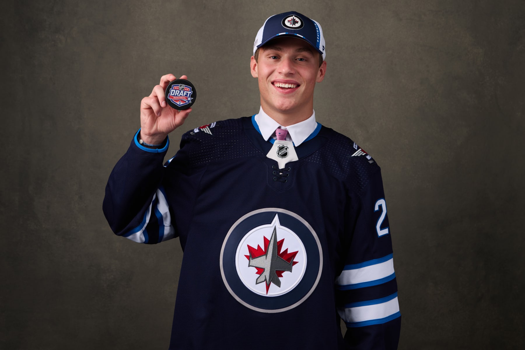 MONTREAL, QUEBEC - JULY 07: Rutger Mcgroarty, #14 pick by the Winnipeg Jets, poses for a portrait during the 2022 Upper Deck NHL Draft at Bell Centre on July 07, 2022 in Montreal, Quebec, Canada. (Photo by Minas Panagiotakis/Getty Images)