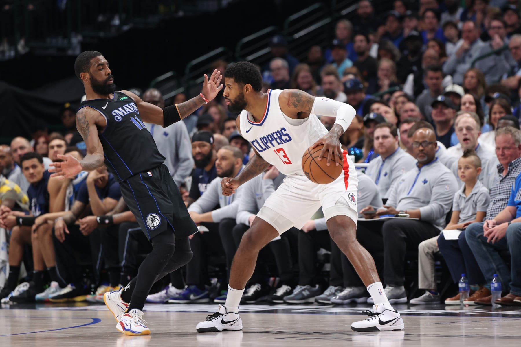 DALLAS, TX - MAY 3: Paul George #13 of the LA Clippers dribbles the ball during the game against the Dallas Mavericks during Round 1 Game 6 of the 2024 NBA Playoffs on May 3, 2024 at the American Airlines Center in Dallas, Texas. NOTE TO USER: User expressly acknowledges and agrees that, by downloading and or using this photograph, User is consenting to the terms and conditions of the Getty Images License Agreement. Mandatory Copyright Notice: Copyright 2024 NBAE (Photo by Joe Murphy/NBAE via Getty Images)