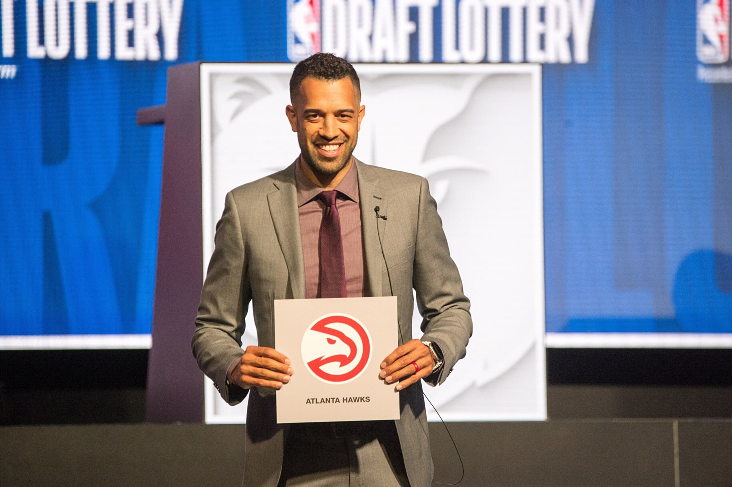 CHICAGO, UNITED STATES - MAY 12: Atlanta Hawks general manager Landry Fields poses for photos after NBA Deputy Commissioner Mark Tatum (not seen) announced that the Hawks had won the first pick in the NBA draft, during the draft lottery in Chicago, United States on May 12, 2024. The Atlanta Hawks won the NBA draft lottery on Sunday, landing the No. 1 pick and a potential cornerstone player in a year where there's no clear-cut choice. (Photo by Jacek Boczarski/Anadolu via Getty Images)