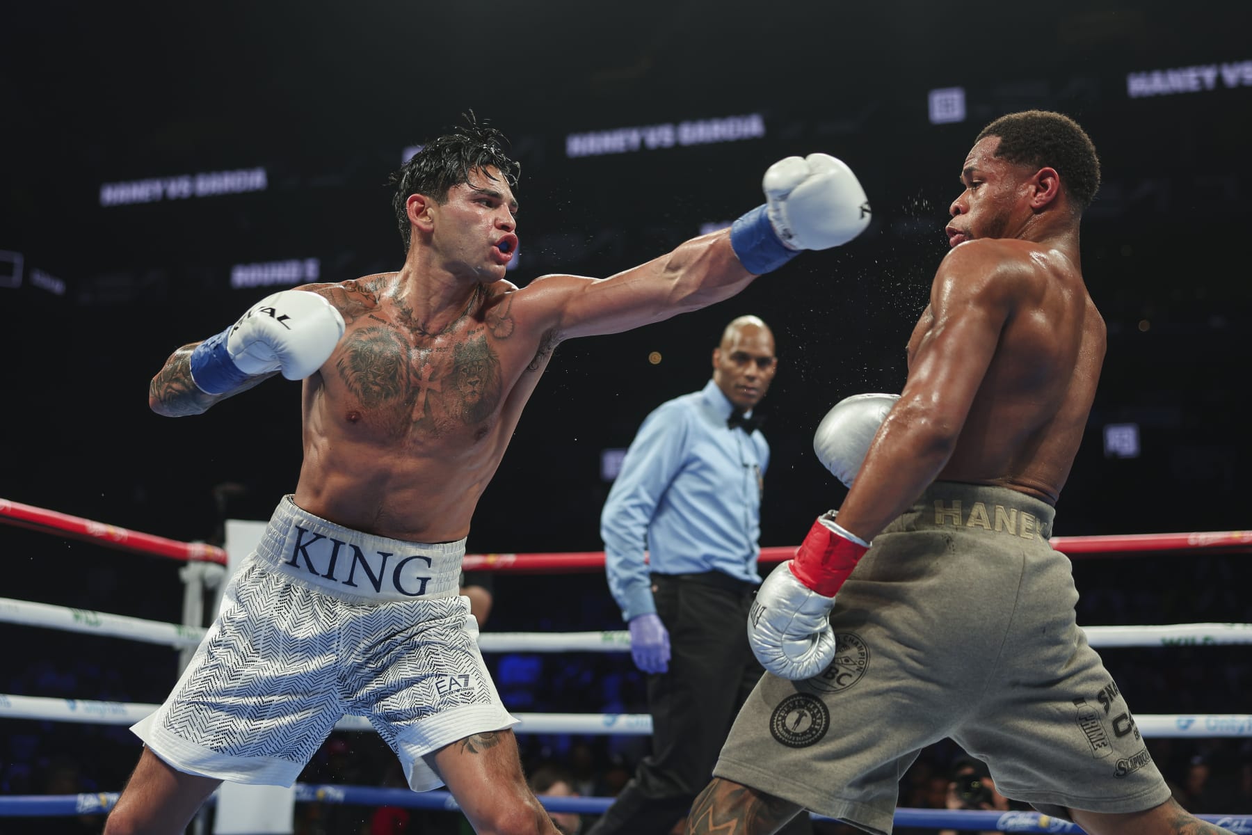 NEW YORK, NEW YORK - APRIL 20: Ryan Garcia throws a punch at Devin Haney during a fight at Barclays Center on April 20, 2024 in New York City.  (Photo by Cris Esqueda/Golden Boy/Getty Images)