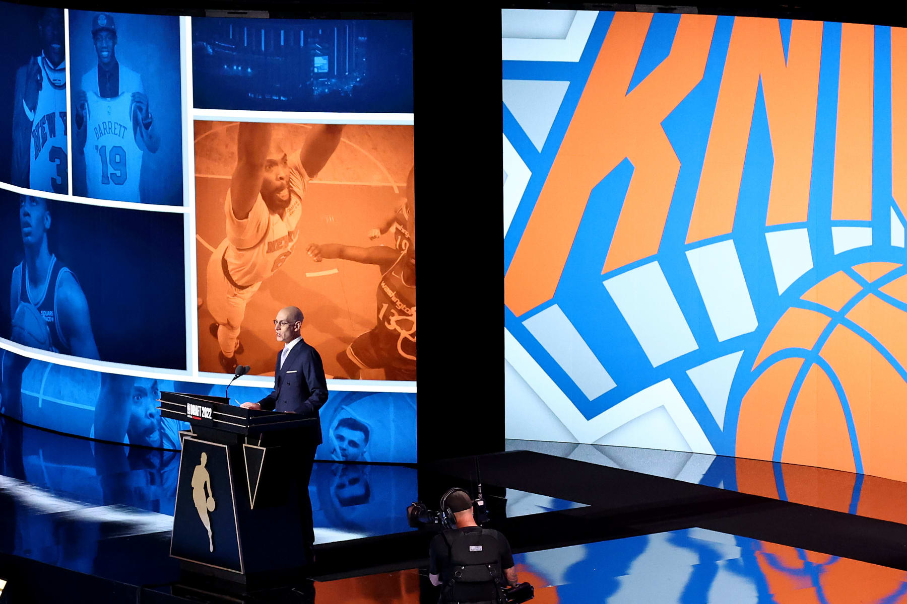 NEW YORK, NEW YORK - JUNE 23: NBA commissioner Adam Silver announces a pick by the New York Knicks during the 2022 NBA Draft at Barclays Center on June 23, 2022 in New York City. NOTE TO USER: User expressly acknowledges and agrees that, by downloading and or using this photograph, User is consenting to the terms and conditions of the Getty Images License Agreement. (Photo by Arturo Holmes/Getty Images)