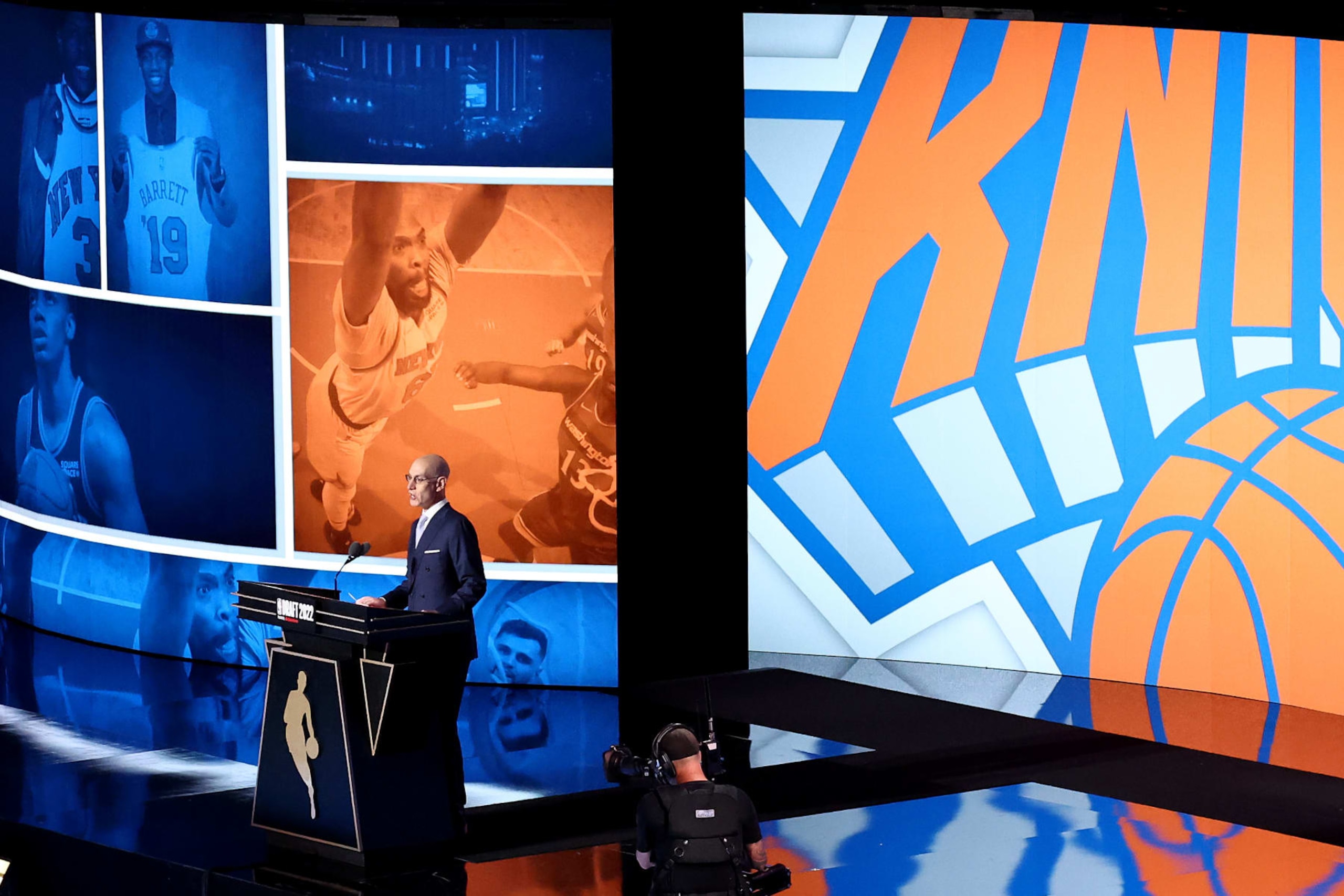 NEW YORK, NEW YORK - JUNE 23: NBA commissioner Adam Silver announces a pick by the New York Knicks during the 2022 NBA Draft at Barclays Center on June 23, 2022 in New York City. NOTE TO USER: User expressly acknowledges and agrees that, by downloading and or using this photograph, User is consenting to the terms and conditions of the Getty Images License Agreement. (Photo by Arturo Holmes/Getty Images) NEW YORK, NEW YORK - JUNE 23: NBA commissioner Adam Silver announces a pick by the New York Knicks during the 2022 NBA Draft at Barclays Center on June 23, 2022 in New York City. NOTE TO USER: User expressly acknowledges and agrees that, by downloading and or using this photograph, User is consenting to the terms and conditions of the Getty Images License Agreement. (Photo by Arturo Holmes/Getty Images)
