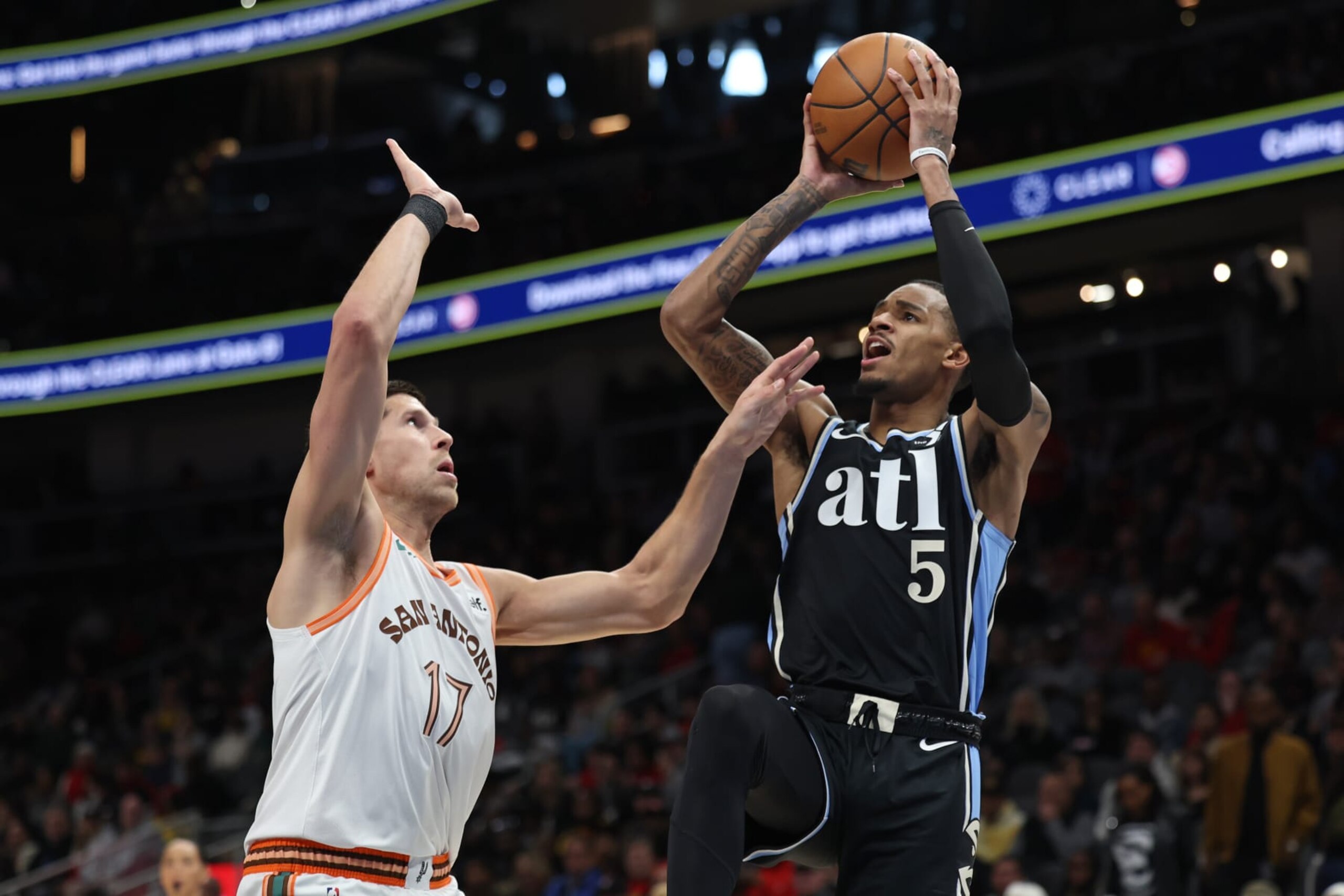 ATLANTA, GA - JANUARY 15: Dejounte Murray #5 of the Atlanta Hawks drives to the basket during the game against the San Antonio Spurs on January 15, 2024 at State Farm Arena in Atlanta, Georgia. NOTE TO USER: User expressly acknowledges and agrees that, by downloading and/or using this Photograph, user is consenting to the terms and conditions of the Getty Images License Agreement. Mandatory Copyright Notice: Copyright 2024 NBAE (Photo by Mercedes Oliver/NBAE via Getty Images) ATLANTA, GA - JANUARY 15: Dejounte Murray #5 of the Atlanta Hawks drives to the basket during the game against the San Antonio Spurs on January 15, 2024 at State Farm Arena in Atlanta, Georgia. NOTE TO USER: User expressly acknowledges and agrees that, by downloading and/or using this Photograph, user is consenting to the terms and conditions of the Getty Images License Agreement. Mandatory Copyright Notice: Copyright 2024 NBAE (Photo by Mercedes Oliver/NBAE via Getty Images)