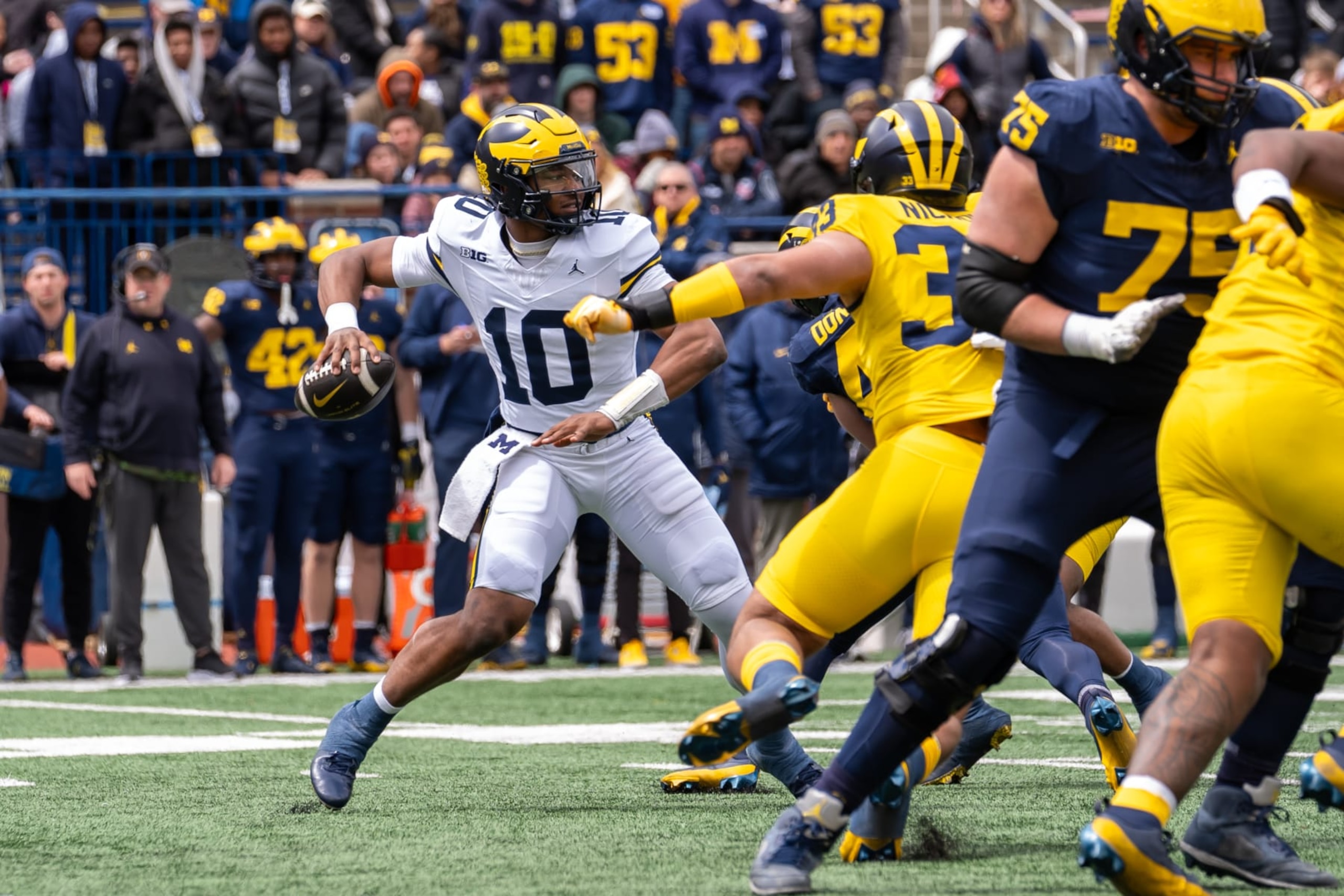 ANN ARBOR, MI - APRIL 20: Alex Orji #10 of the Blue Team looks to pass in the second quarter of the Michigan football spring game at Michigan Stadium on April 20, 2024 in Ann Arbor, Michigan. (Photo by Jaime Crawford/Getty Images)