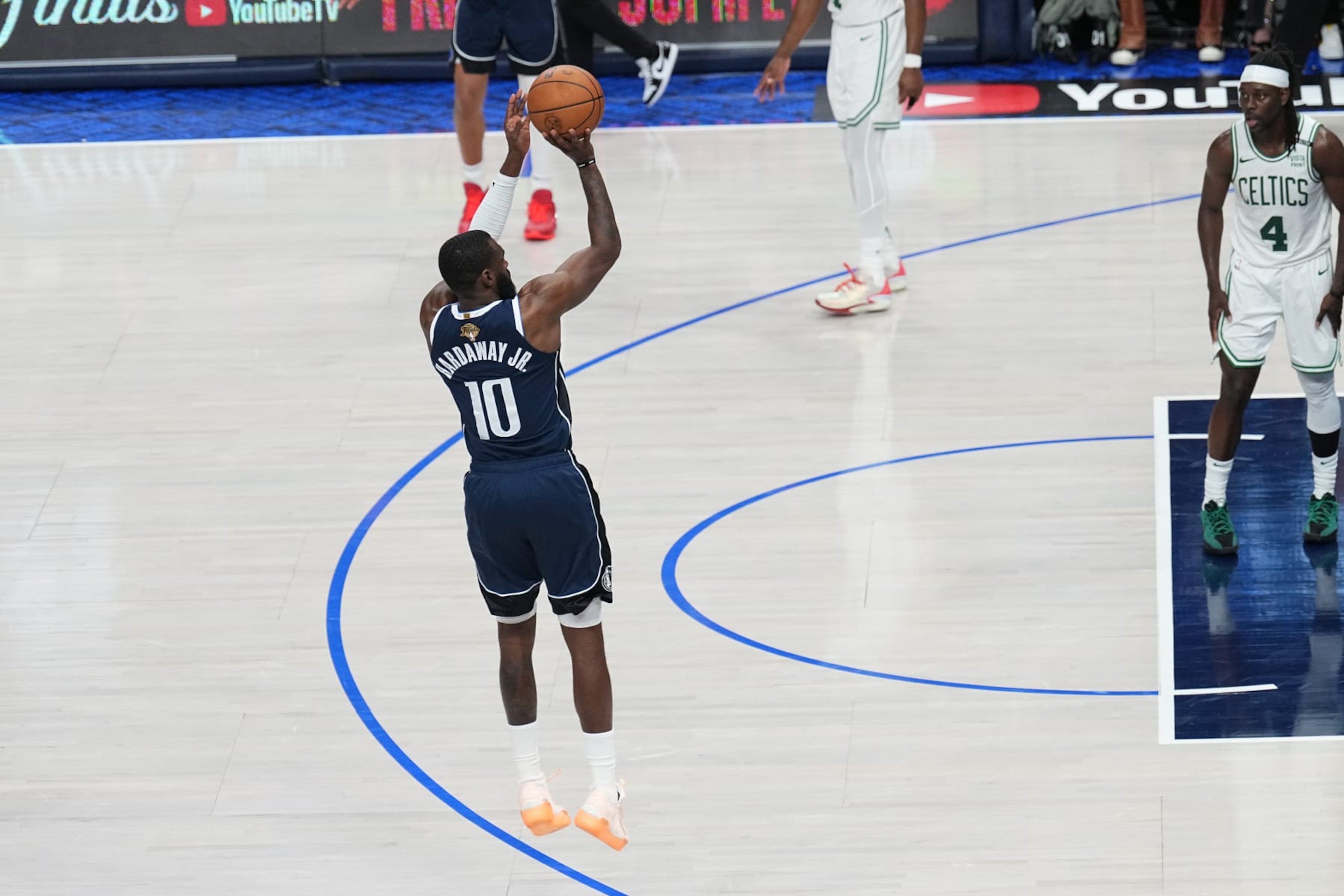 DALLAS, TX - JUNE 12: Tim Hardaway Jr. #10 of the Dallas Mavericks shoots a three point basket during the game against the Boston Celtics during Game Three of the 2024 NBA Finals on June 12, 2024 at the American Airlines Center in Dallas, Texas. NOTE TO USER: User expressly acknowledges and agrees that, by downloading and or using this photograph, User is consenting to the terms and conditions of the Getty Images License Agreement. Mandatory Copyright Notice: Copyright 2024 NBAE (Photo by Glenn James/NBAE via Getty Images) DALLAS, TX - JUNE 12: Tim Hardaway Jr. #10 of the Dallas Mavericks shoots a three point basket during the game against the Boston Celtics during Game Three of the 2024 NBA Finals on June 12, 2024 at the American Airlines Center in Dallas, Texas. NOTE TO USER: User expressly acknowledges and agrees that, by downloading and or using this photograph, User is consenting to the terms and conditions of the Getty Images License Agreement. Mandatory Copyright Notice: Copyright 2024 NBAE (Photo by Glenn James/NBAE via Getty Images)