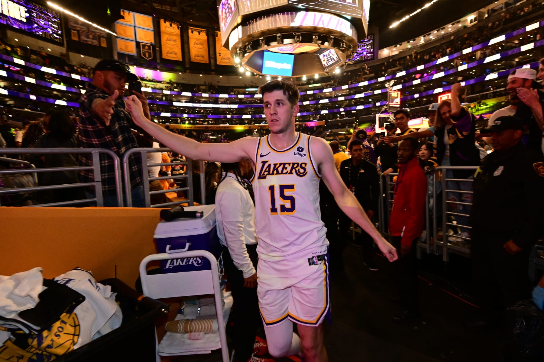 LOS ANGELES, CA - APRIL 27: Austin Reaves #15 of the Los Angeles Lakers greets the fans after the game against the Denver Nuggets during Round 1 Game 4 of the 2024 NBA Playoffs on April 27, 2024 at Crypto.Com Arena in Los Angeles, California. NOTE TO USER: User expressly acknowledges and agrees that, by downloading and/or using this Photograph, user is consenting to the terms and conditions of the Getty Images License Agreement. Mandatory Copyright Notice: Copyright 2024 NBAE (Photo by Adam Pantozzi/NBAE via Getty Images)