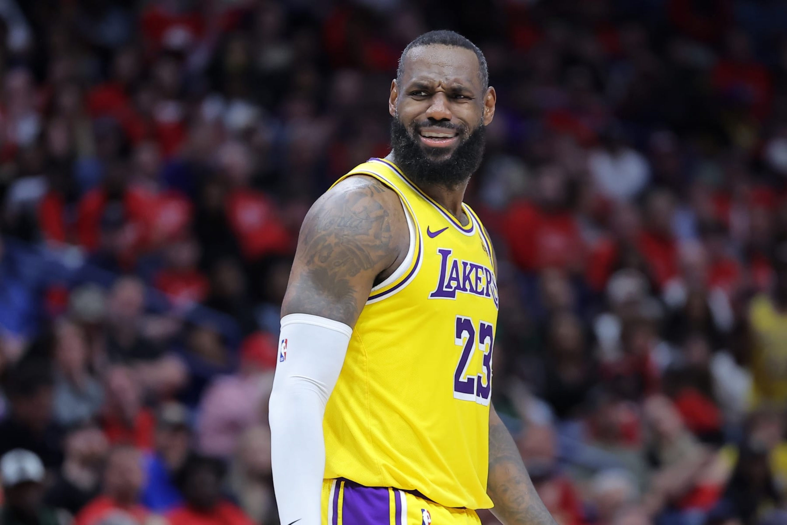 NEW ORLEANS, LOUISIANA - APRIL 16: LeBron James #23 of the Los Angeles Lakers reacts against the New Orleans Pelicans during a play-in tournament game at the Smoothie King Center on April 16, 2024 in New Orleans, Louisiana. NOTE TO USER: User expressly acknowledges and agrees that, by downloading and or using this Photograph, user is consenting to the terms and conditions of the Getty Images License Agreement. (Photo by Jonathan Bachman/Getty Images)