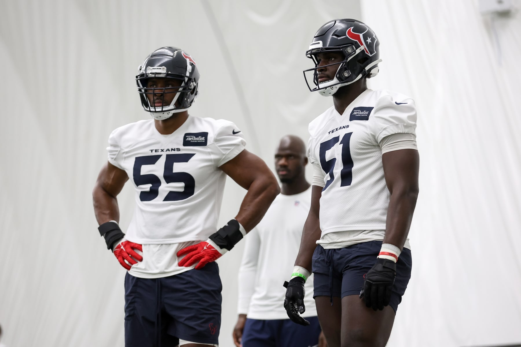 HOUSTON, TEXAS - JUNE 05: Danielle Hunter #55 of the Houston Texans and Will Anderson Jr. #51 participate in drills during mandatory minicamp at Houston Methodist Training Center on June 05, 2024 in Houston, Texas. (Photo by Tim Warner/Getty Images)