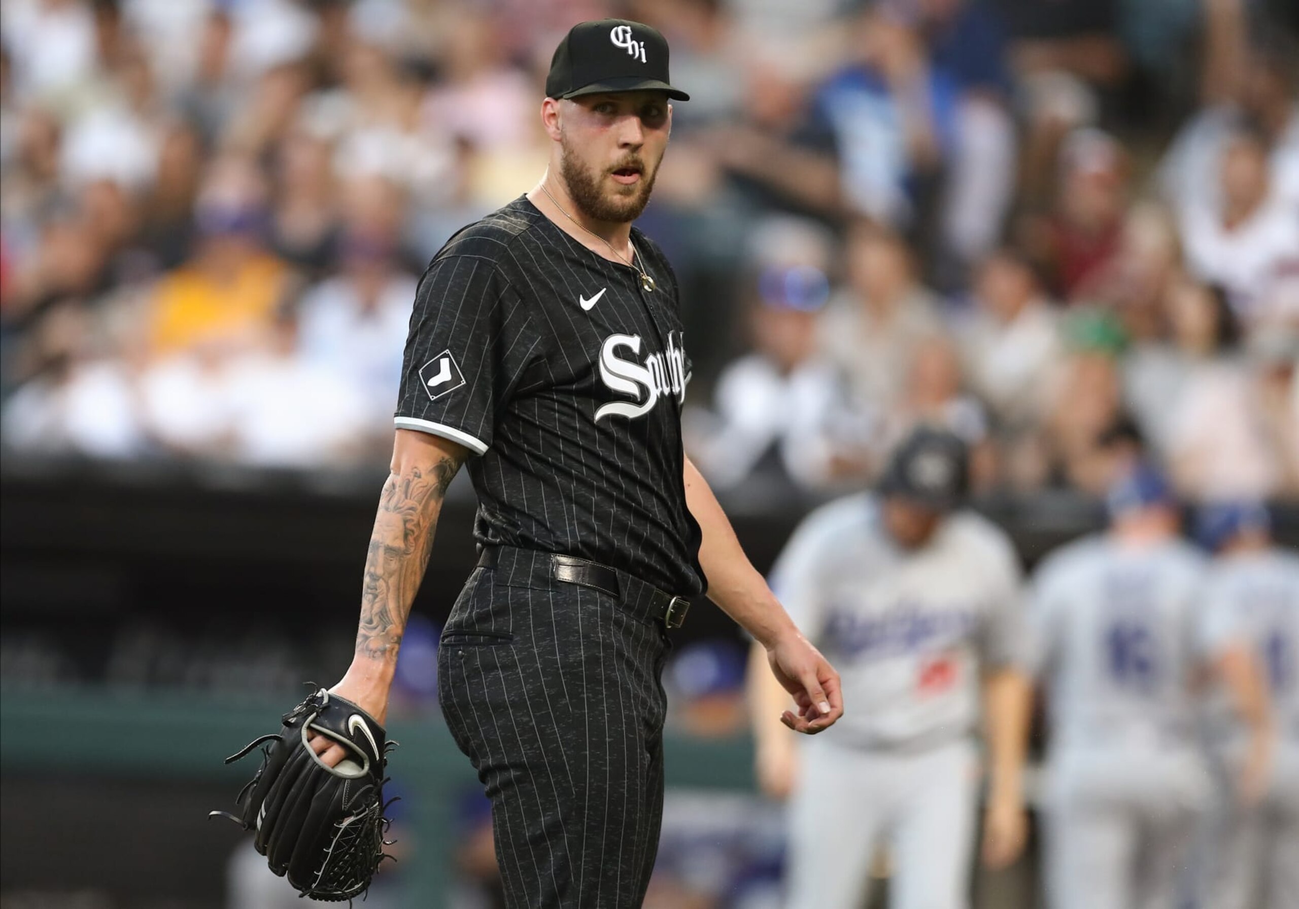 CHICAGO, IL - JUNE 24: Garrett Crochet #45 of the Chicago White Sox looks on as he walks back to the dugout after the final out in the during the third inning against the Los Angeles Dodgers on June 24, 2024 at Guaranteed Rate Field in Chicago,Illinois. (Photo by Melissa Tamez/Icon Sportswire via Getty Images) CHICAGO, IL - JUNE 24: Garrett Crochet #45 of the Chicago White Sox looks on as he walks back to the dugout after the final out in the during the third inning against the Los Angeles Dodgers on June 24, 2024 at Guaranteed Rate Field in Chicago,Illinois. (Photo by Melissa Tamez/Icon Sportswire via Getty Images)