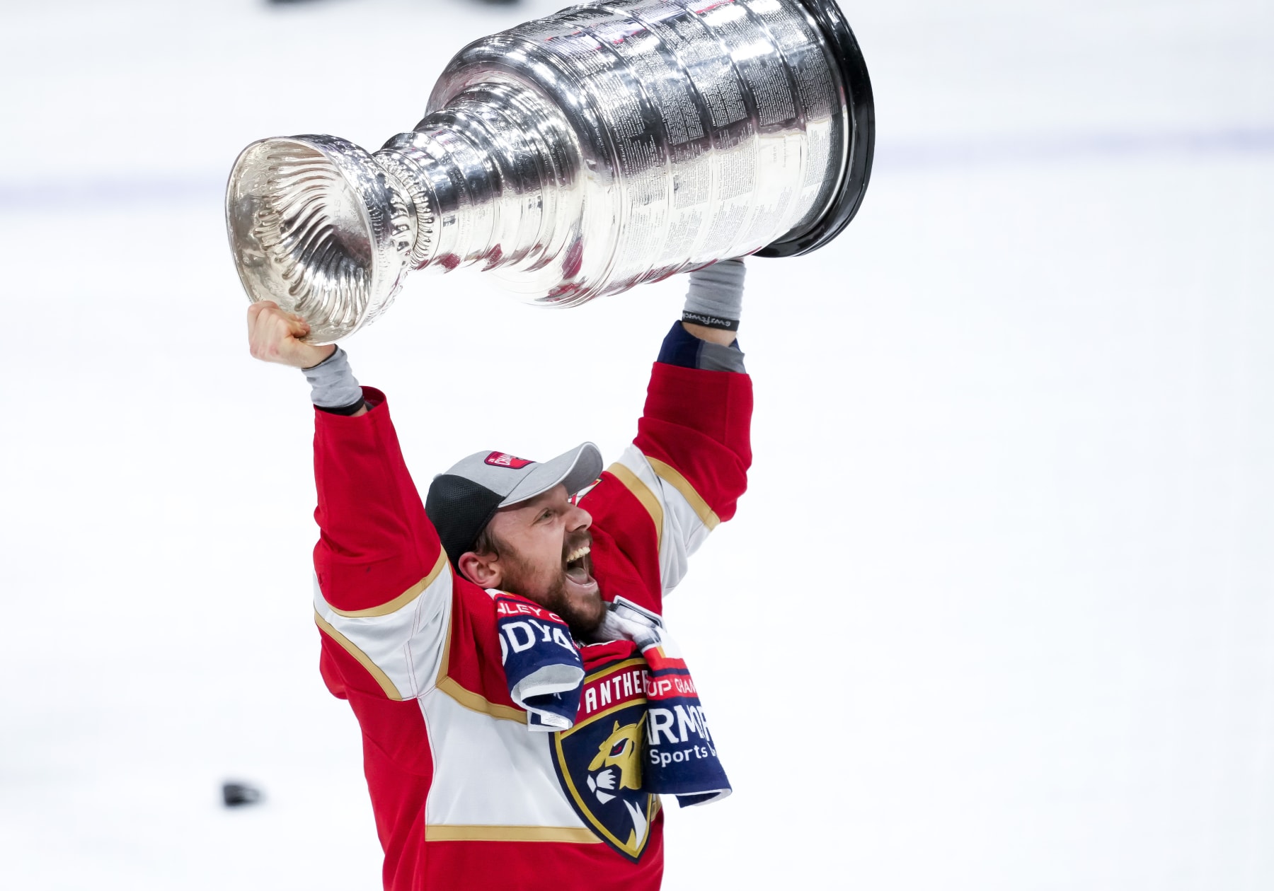 SUNRISE, FL - JUNE 24:  Florida Panthers center Sam Reinhart (13) raises the Stanley Cup  during the NHL Stanley Cup Finals, Game 7 between the Florida Panthers and Edmonton Oilers on June 24th, 2024 at Amerant Bank Arena in Sunrise, FL. (Photo by Andrew Bershaw/Icon Sportswire via Getty Images)