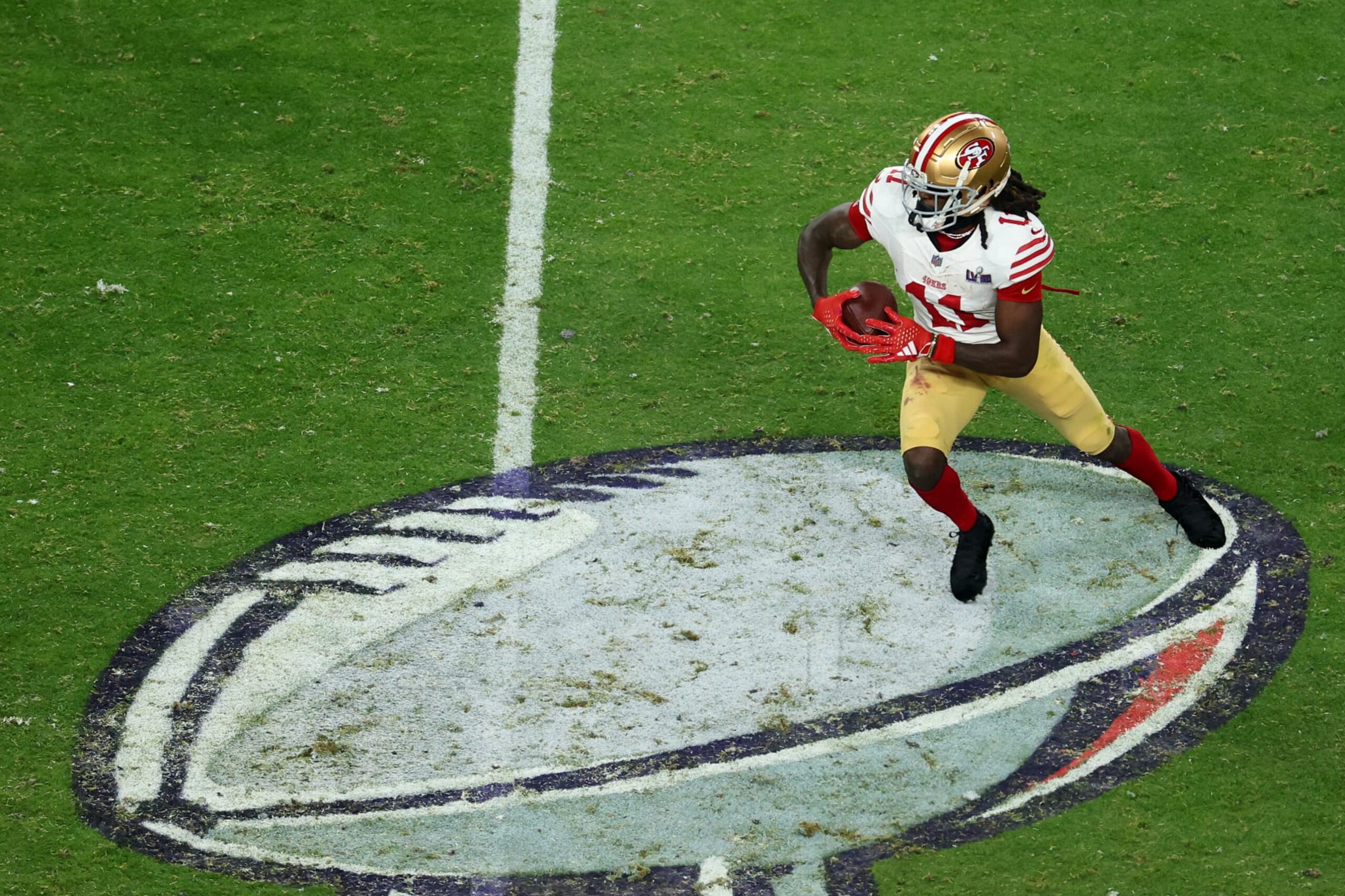 LAS VEGAS, NEVADA - FEBRUARY 11: Brandon Aiyuk #11 of the San Francisco 49ers runs the ball after a catch during the fourth quarter against the Kansas City Chiefs during Super Bowl LVIII at Allegiant Stadium on February 11, 2024 in Las Vegas, Nevada. (Photo by Michael Reaves/Getty Images)