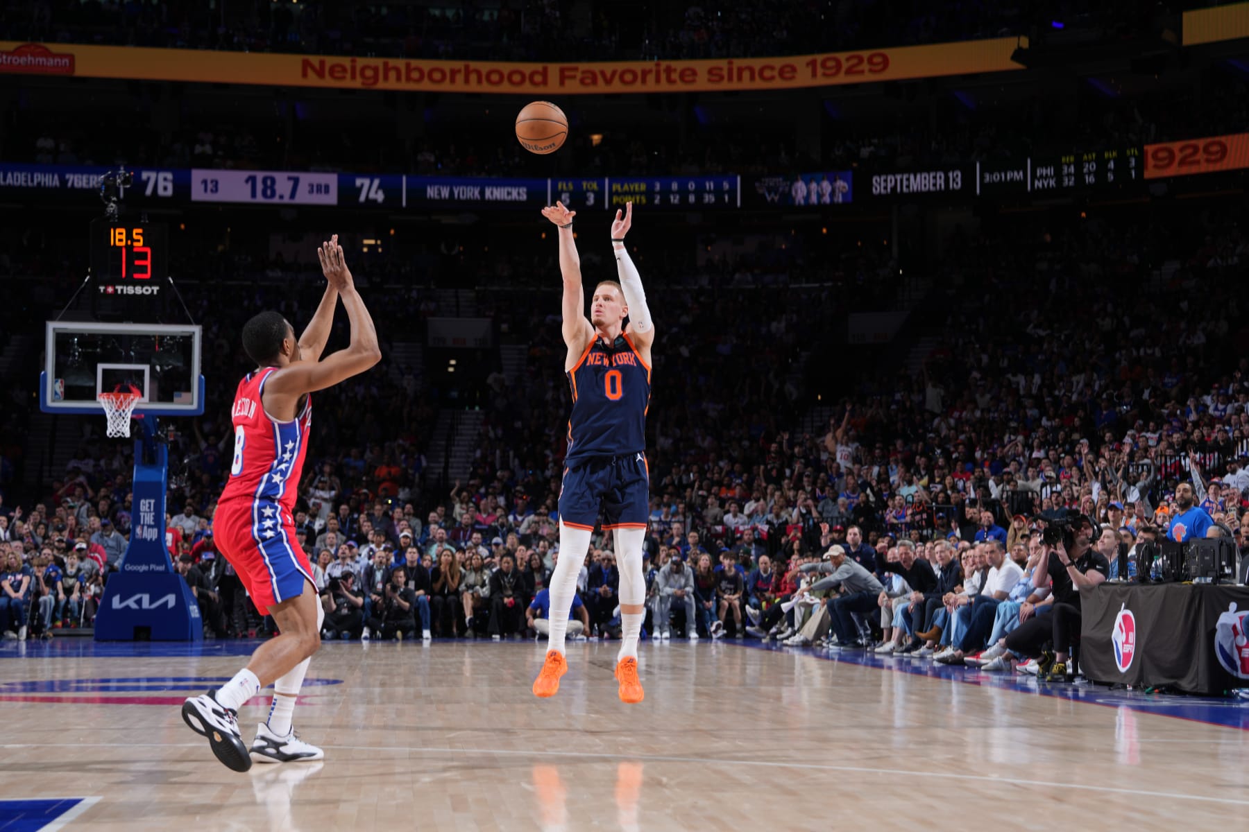 PHILADELPHIA, PA - APRIL 28: Donte Divincenzo #0 of the New York Knicks shoots a three point basket during the game against the Philadelphia 76ers during Round 1 Game 4 of the 2024 NBA Playoffs on April 28, 2024 at the Wells Fargo Center in Philadelphia, Pennsylvania NOTE TO USER: User expressly acknowledges and agrees that, by downloading and/or using this Photograph, user is consenting to the terms and conditions of the Getty Images License Agreement. Mandatory Copyright Notice: Copyright 2024 NBAE (Photo by Jesse D. Garrabrant/NBAE via Getty Images)