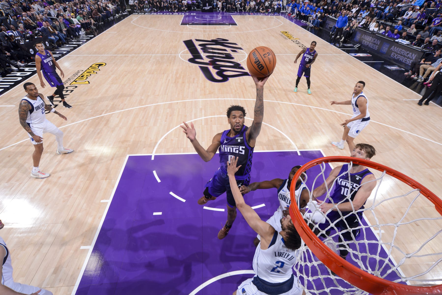 SACRAMENTO, CA - MARCH 26: Malik Monk #0 of the Sacramento Kings shoots the ball during the game against the Dallas Mavericks on March 26, 2024 at Golden 1 Center in Sacramento, California. NOTE TO USER: User expressly acknowledges and agrees that, by downloading and or using this Photograph, user is consenting to the terms and conditions of the Getty Images License Agreement. Mandatory Copyright Notice: Copyright 2024 NBAE (Photo by Rocky Widner/NBAE via Getty Images)