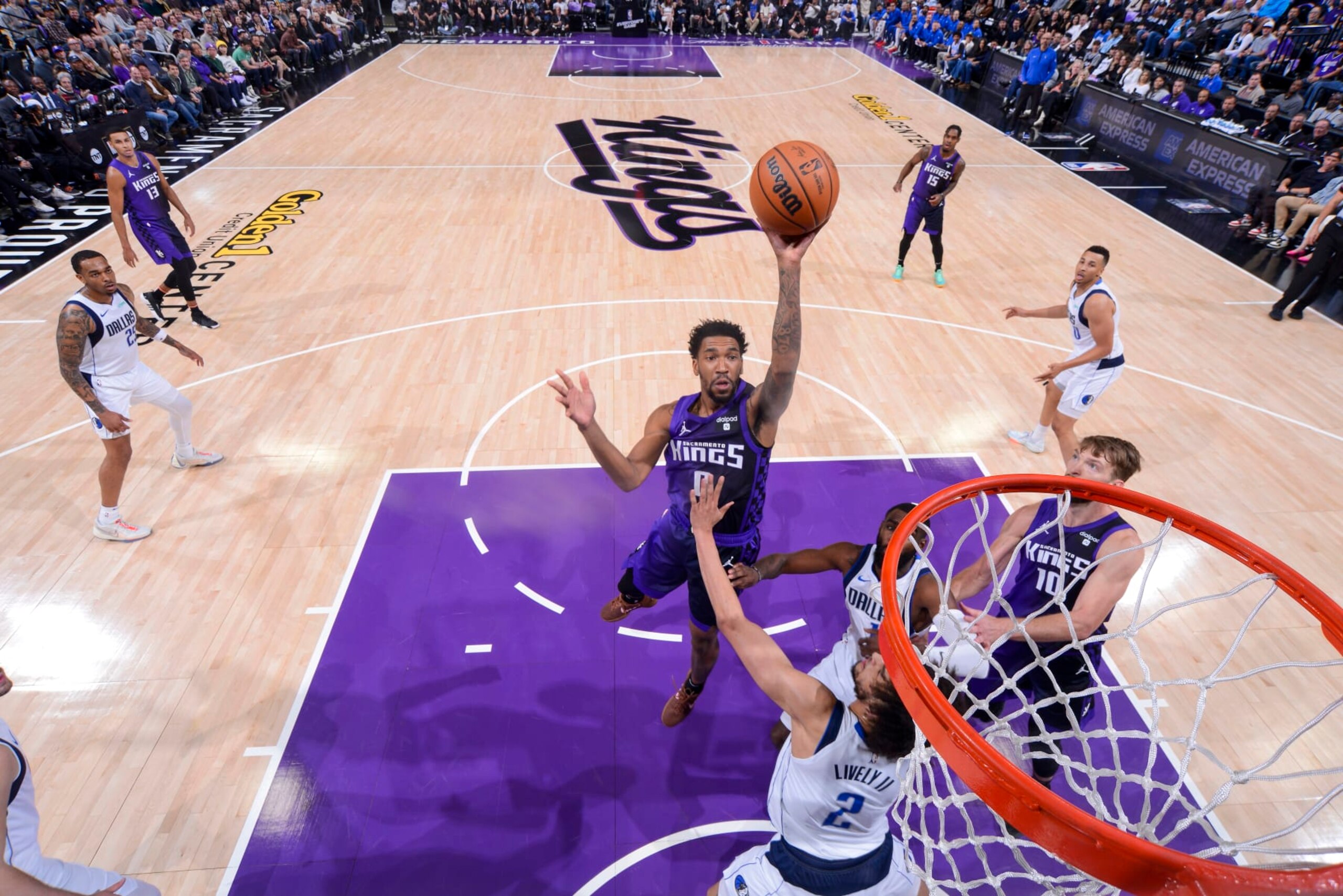 SACRAMENTO, CA - MARCH 26: Malik Monk #0 of the Sacramento Kings shoots the ball during the game against the Dallas Mavericks on March 26, 2024 at Golden 1 Center in Sacramento, California. NOTE TO USER: User expressly acknowledges and agrees that, by downloading and or using this Photograph, user is consenting to the terms and conditions of the Getty Images License Agreement. Mandatory Copyright Notice: Copyright 2024 NBAE (Photo by Rocky Widner/NBAE via Getty Images)