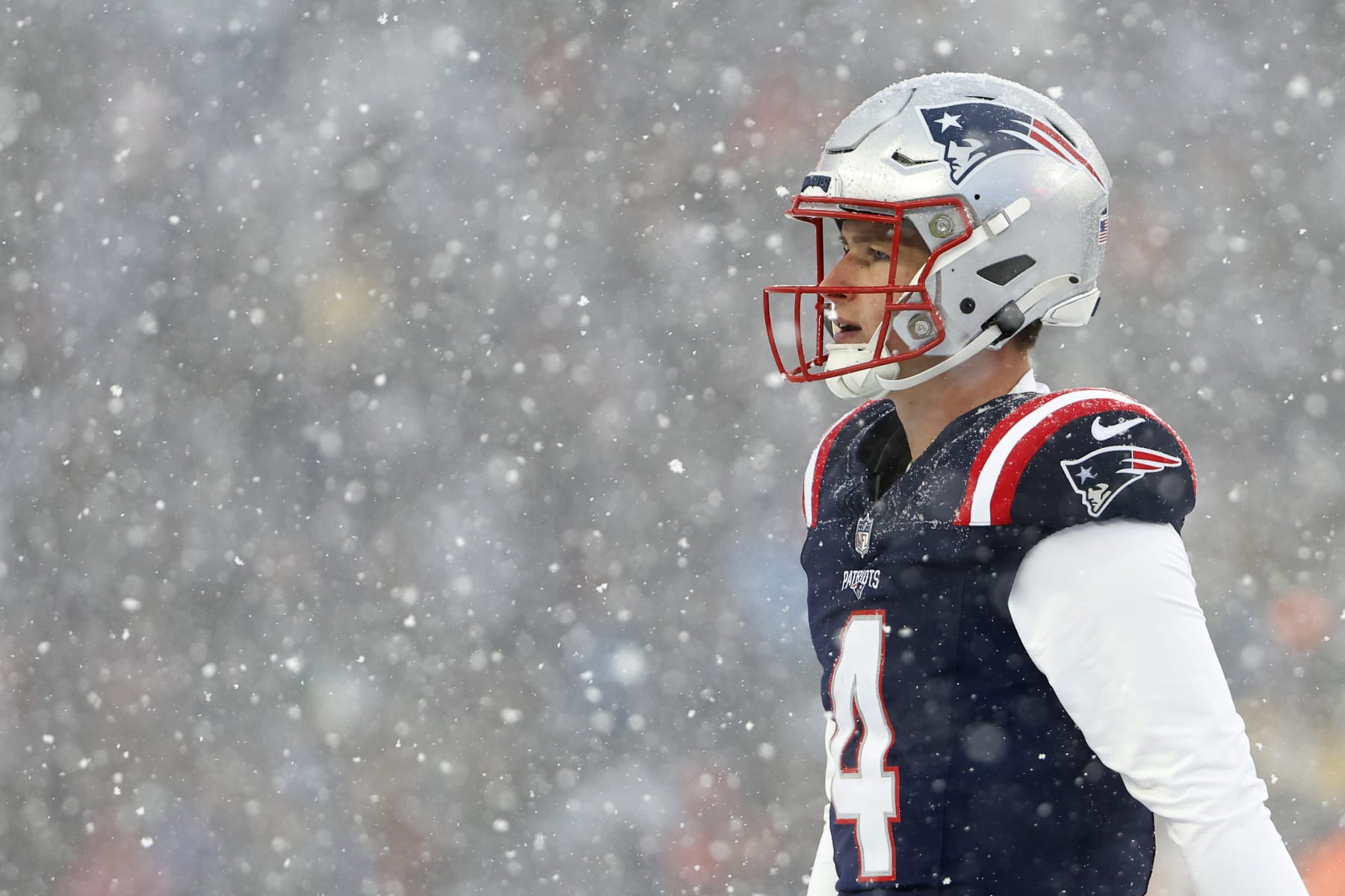 FOXBOROUGH, MA - JANUARY 7: Bailey Zappe #4 of the New England Patriots walks off the field during their game against the New York Jets at Gillette Stadium on January 7, 2024 in Foxborough, Massachusetts.(Photo By Winslow Townson/Getty Images)
