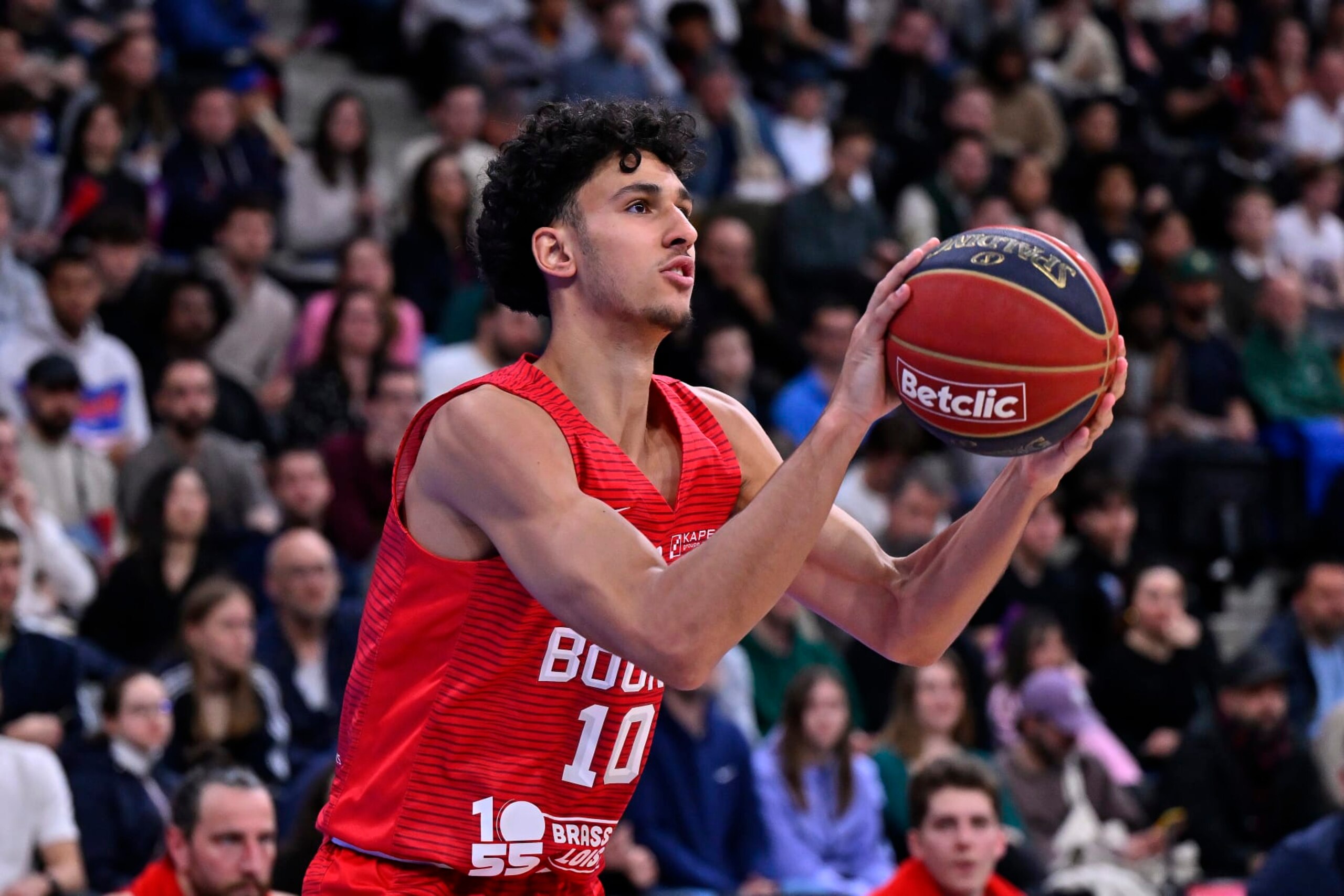 PARIS, FRANCE - APRIL 28: Zaccharie Risacher of Bourg en Bresse Basket takes a jump shoot during the Betclic Elite match between Paris and Bourg en Bresse Basket at Adidas Arena on April 28, 2024 in Paris, France. (Photo by Aurelien Meunier/Getty Images)