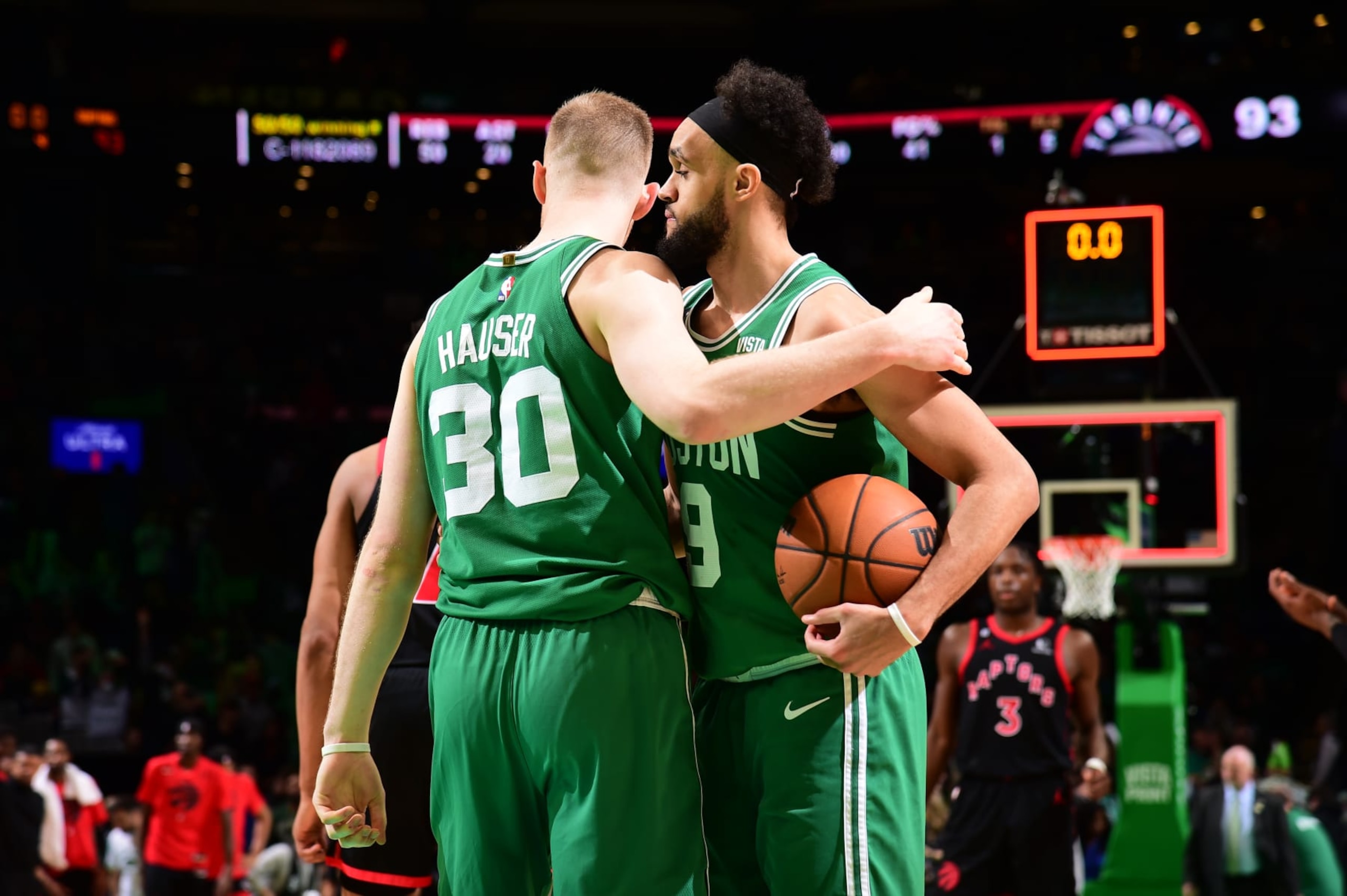 BOSTON, MA - APRIL 5: Sam Hauser #30 embraces Derrick White #9 of the Boston Celtics after the game against the Toronto Raptors on April 5, 2023 at the TD Garden in Boston, Massachusetts. NOTE TO USER: User expressly acknowledges and agrees that, by downloading and or using this photograph, User is consenting to the terms and conditions of the Getty Images License Agreement. Mandatory Copyright Notice: Copyright 2023 NBAE (Photo by Brian Babineau/NBAE via Getty Images) BOSTON, MA - APRIL 5: Sam Hauser #30 embraces Derrick White #9 of the Boston Celtics after the game against the Toronto Raptors on April 5, 2023 at the TD Garden in Boston, Massachusetts. NOTE TO USER: User expressly acknowledges and agrees that, by downloading and or using this photograph, User is consenting to the terms and conditions of the Getty Images License Agreement. Mandatory Copyright Notice: Copyright 2023 NBAE (Photo by Brian Babineau/NBAE via Getty Images)