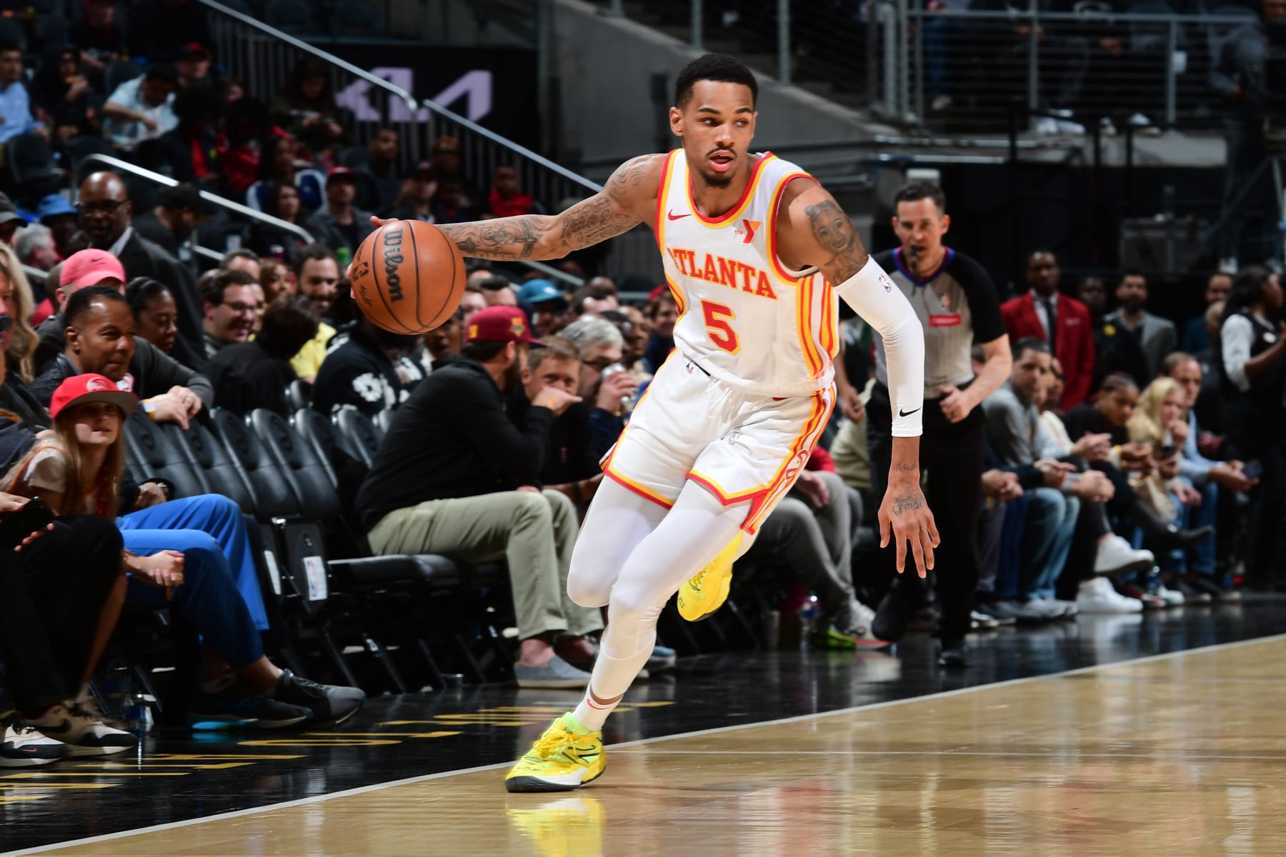 ATLANTA, GA - APRIL 3: Dejounte Murray #5 of the Atlanta Hawks dribbles the ball during the game against the Detroit Pistons on April 3, 2024 at State Farm Arena in Atlanta, Georgia.  NOTE TO USER: User expressly acknowledges and agrees that, by downloading and/or using this Photograph, user is consenting to the terms and conditions of the Getty Images License Agreement. Mandatory Copyright Notice: Copyright 2024 NBAE (Photo by Scott Cunningham/NBAE via Getty Images)