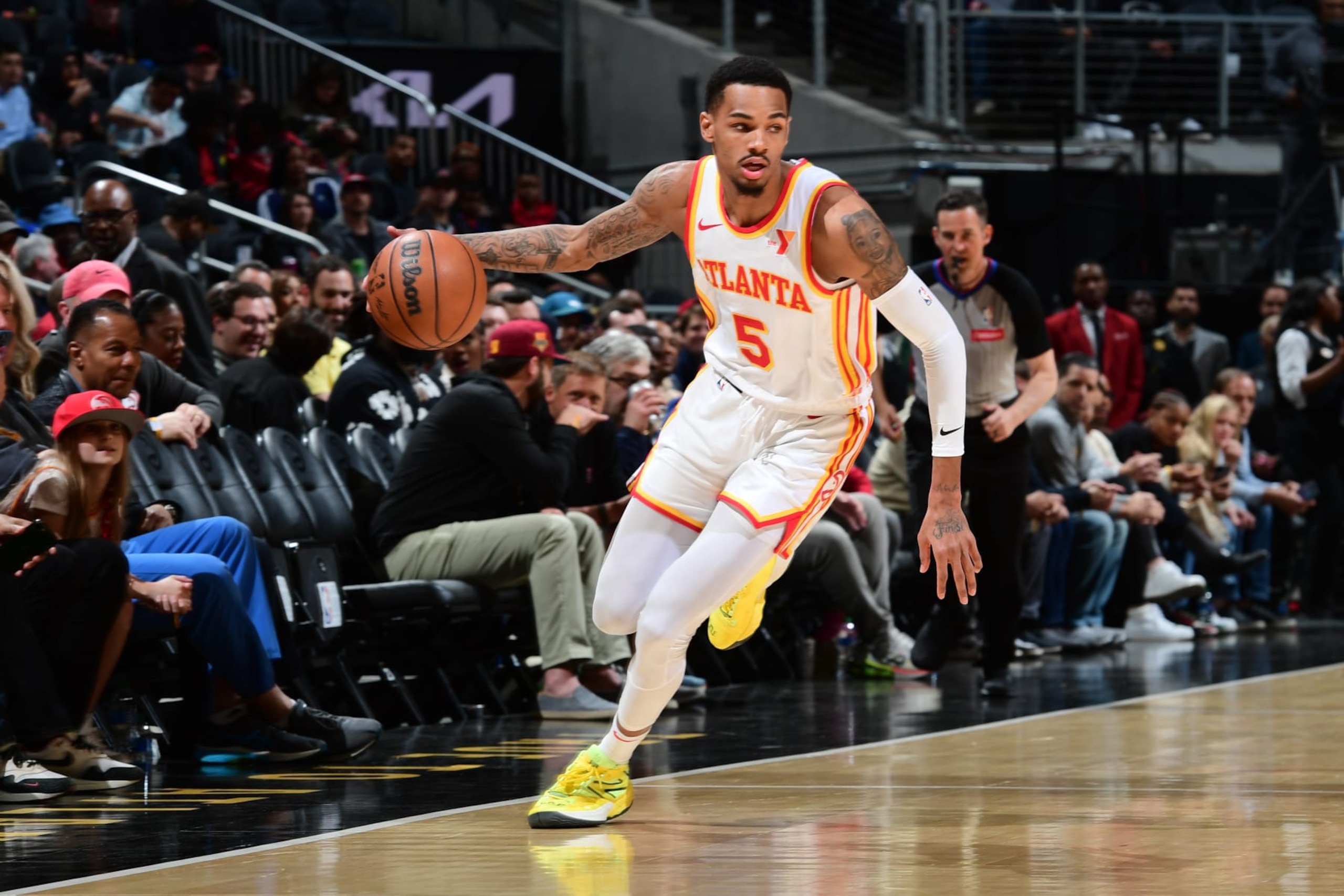 ATLANTA, GA - APRIL 3: Dejounte Murray #5 of the Atlanta Hawks dribbles the ball during the game against the Detroit Pistons on April 3, 2024 at State Farm Arena in Atlanta, Georgia.  NOTE TO USER: User expressly acknowledges and agrees that, by downloading and/or using this Photograph, user is consenting to the terms and conditions of the Getty Images License Agreement. Mandatory Copyright Notice: Copyright 2024 NBAE (Photo by Scott Cunningham/NBAE via Getty Images)