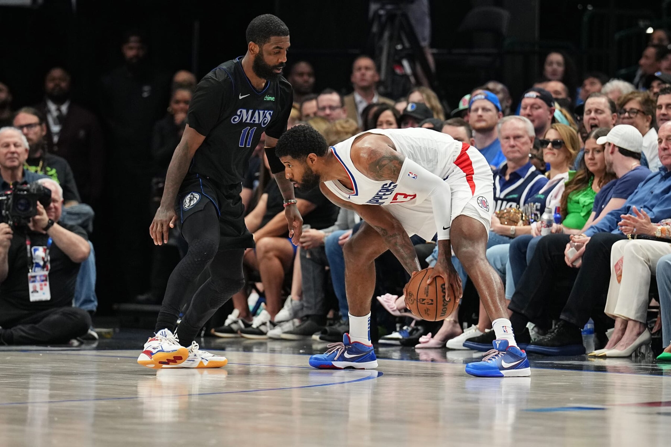 DALLAS, TX - MAY 3: Paul George #13 of the LA Clippers handles the ball during the game against the Dallas Mavericks during Round 1 Game 6 of the 2024 NBA Playoffs  on May 3, 2024  at the American Airlines Center in Dallas, Texas. NOTE TO USER: User expressly acknowledges and agrees that, by downloading and or using this photograph, User is consenting to the terms and conditions of the Getty Images License Agreement. Mandatory Copyright Notice: Copyright 2024 NBAE (Photo by Glenn James/NBAE via Getty Images)