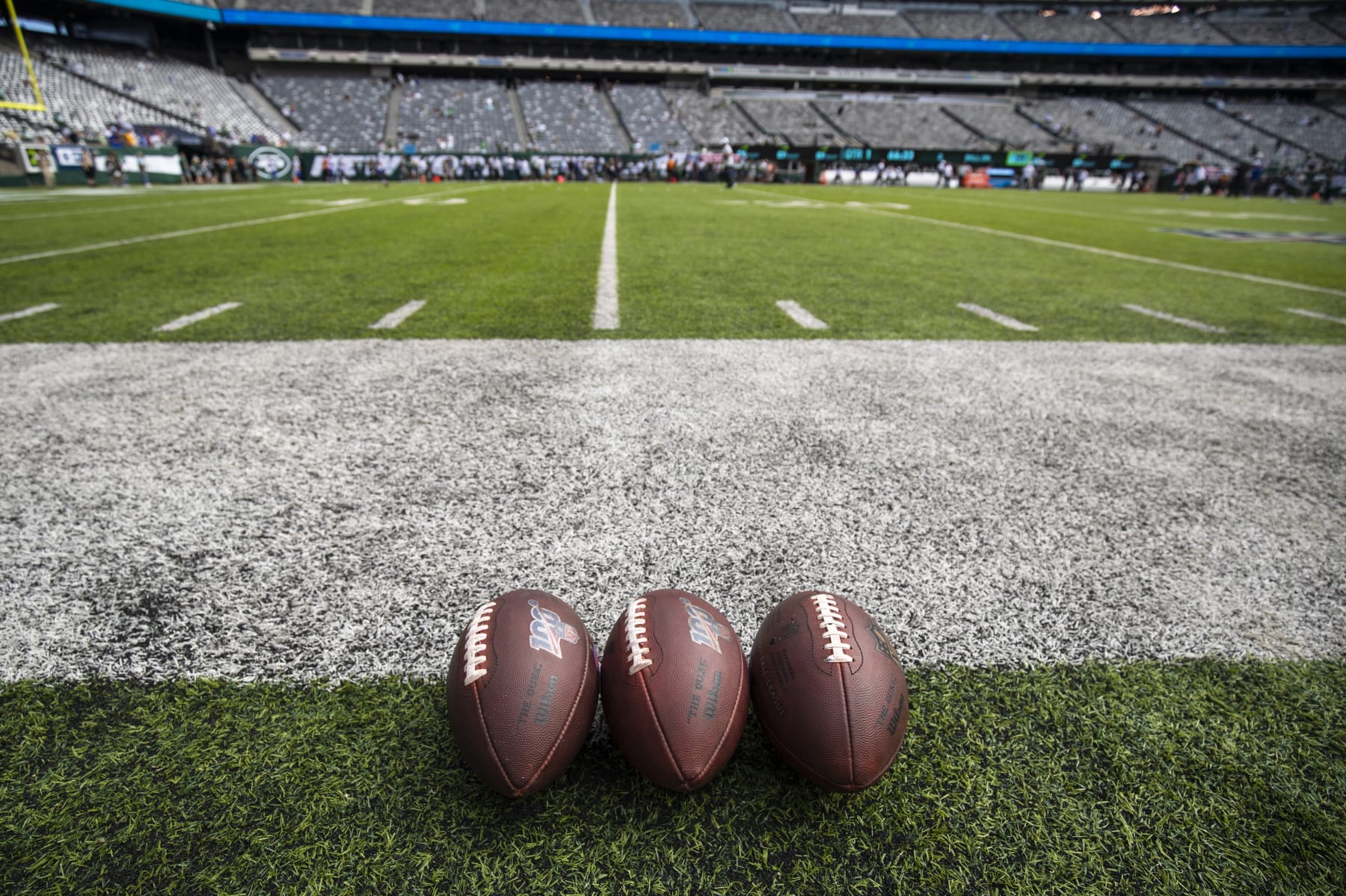 EAST RUTHERFORD, NJ - SEPTEMBER 08:  Detail view of three NFL footballs on the sideline before the game between the New York Jets and the Buffalo Bills at MetLife Stadium on September 8, 2019 in East Rutherford, New Jersey. Buffalo defeats New York 17-16.  (Photo by Brett Carlsen/Getty Images)