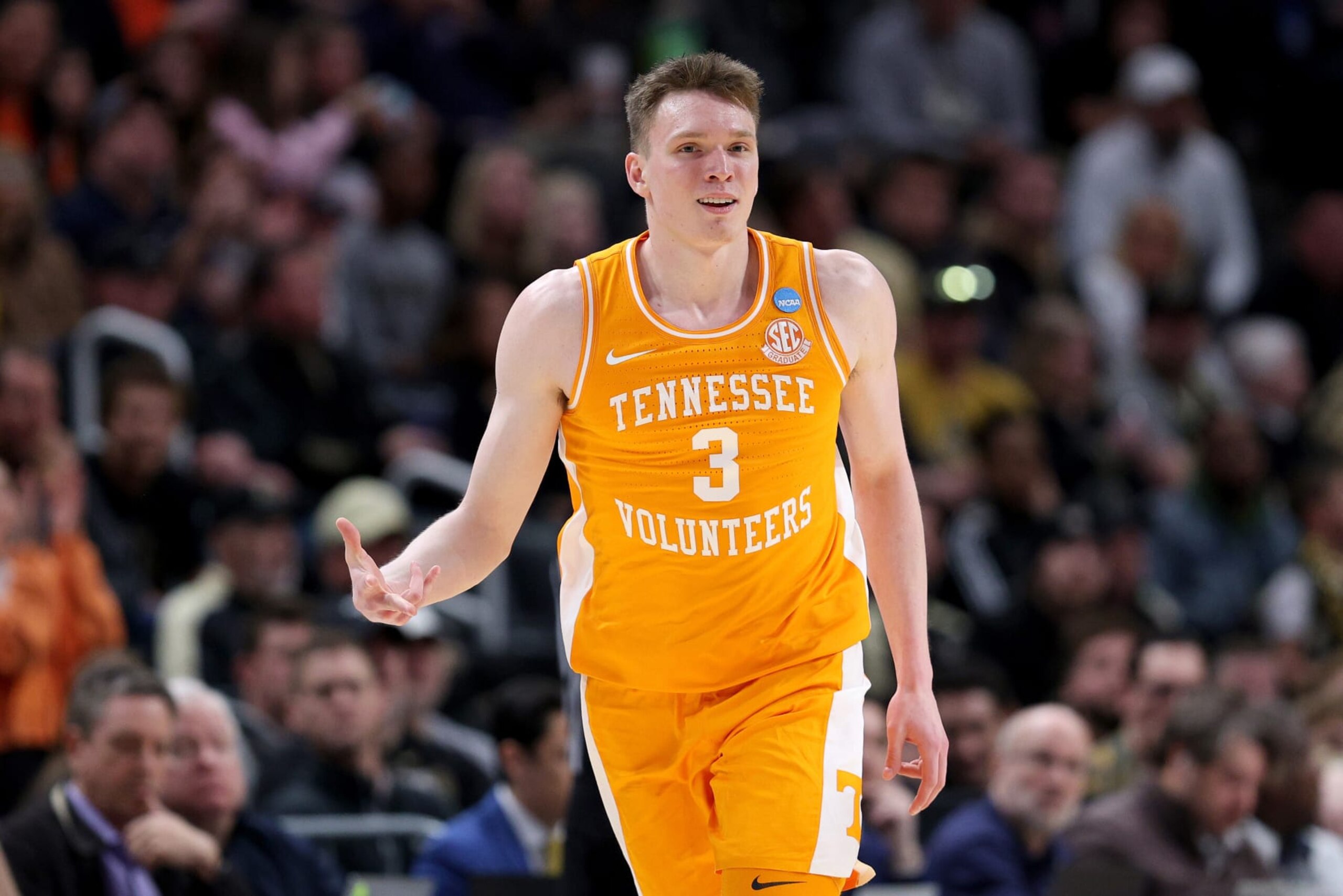 DETROIT, MICHIGAN - MARCH 31: Dalton Knecht #3 of the Tennessee Volunteers celebrates a three point basket against the Purdue Boilermakers during the first half in the Elite 8 round of the NCAA Men's Basketball Tournament at Little Caesars Arena on March 31, 2024 in Detroit, Michigan. (Photo by Mike Mulholland/Getty Images) DETROIT, MICHIGAN - MARCH 31: Dalton Knecht #3 of the Tennessee Volunteers celebrates a three point basket against the Purdue Boilermakers during the first half in the Elite 8 round of the NCAA Men's Basketball Tournament at Little Caesars Arena on March 31, 2024 in Detroit, Michigan. (Photo by Mike Mulholland/Getty Images)
