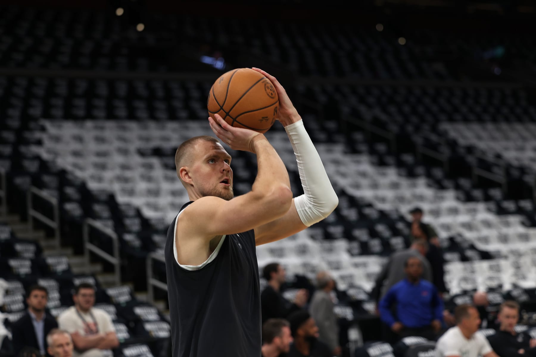 BOSTON, MA - JUNE 17: Kristaps Porzingis #8 of the Boston Celtics warms up before the game against the Dallas Mavericks during Game 5 of the 2024 NBA Finals on June 17, 2024 at the TD Garden in Boston, Massachusetts. NOTE TO USER: User expressly acknowledges and agrees that, by downloading and or using this photograph, User is consenting to the terms and conditions of the Getty Images License Agreement. Mandatory Copyright Notice: Copyright 2024 NBAE  (Photo by Grace Beal/NBAE via Getty Images)