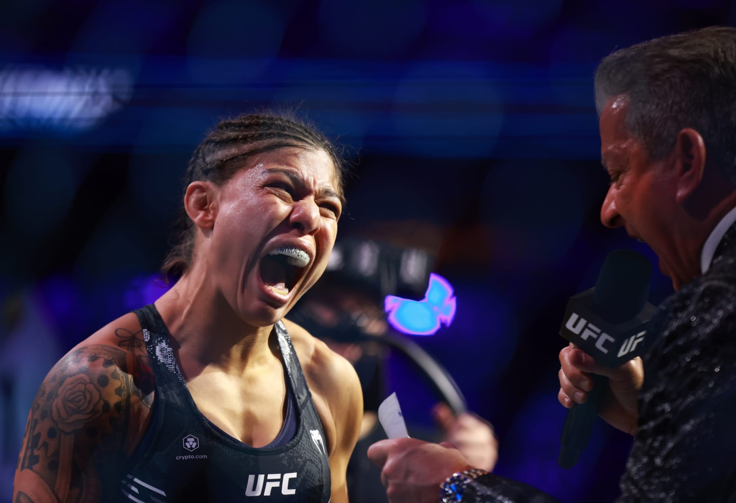 Mayra Bueno Silva is introduced to the crowd by Bruce Buffer. Mayra Bueno Silva is introduced to the crowd by Bruce Buffer.